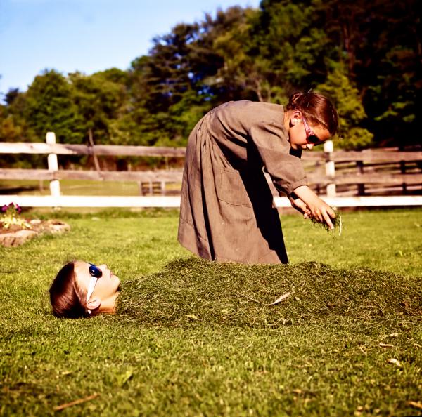 Image from Home/Land -  Amish neighbor children Dorothy and Mary playing in the...
