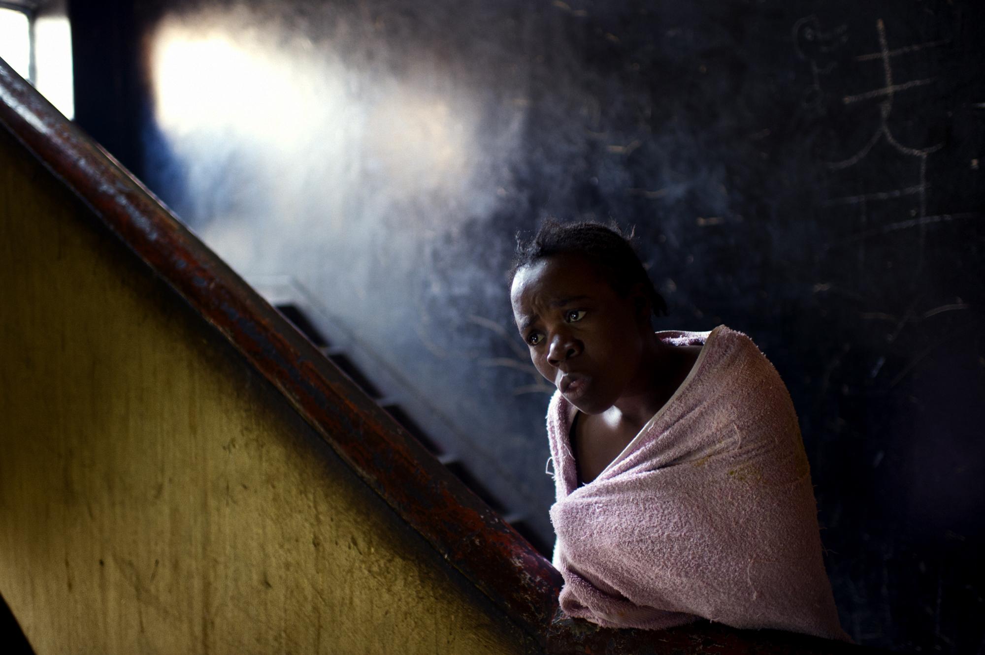 Into the shadows - Johannesburg, South Africa. June 2011. A Zimbabwean...