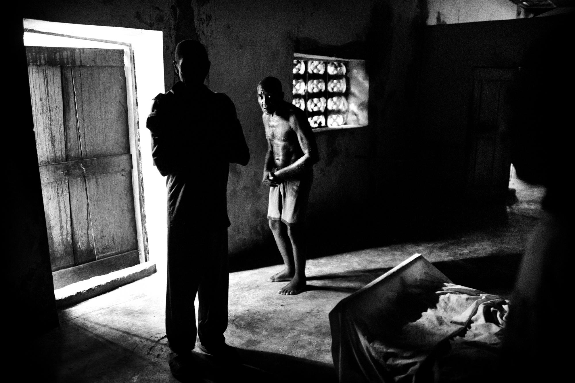 Hospice/ Haiti - Petit Guave, Haiti.
June 2010.
An inmate with...