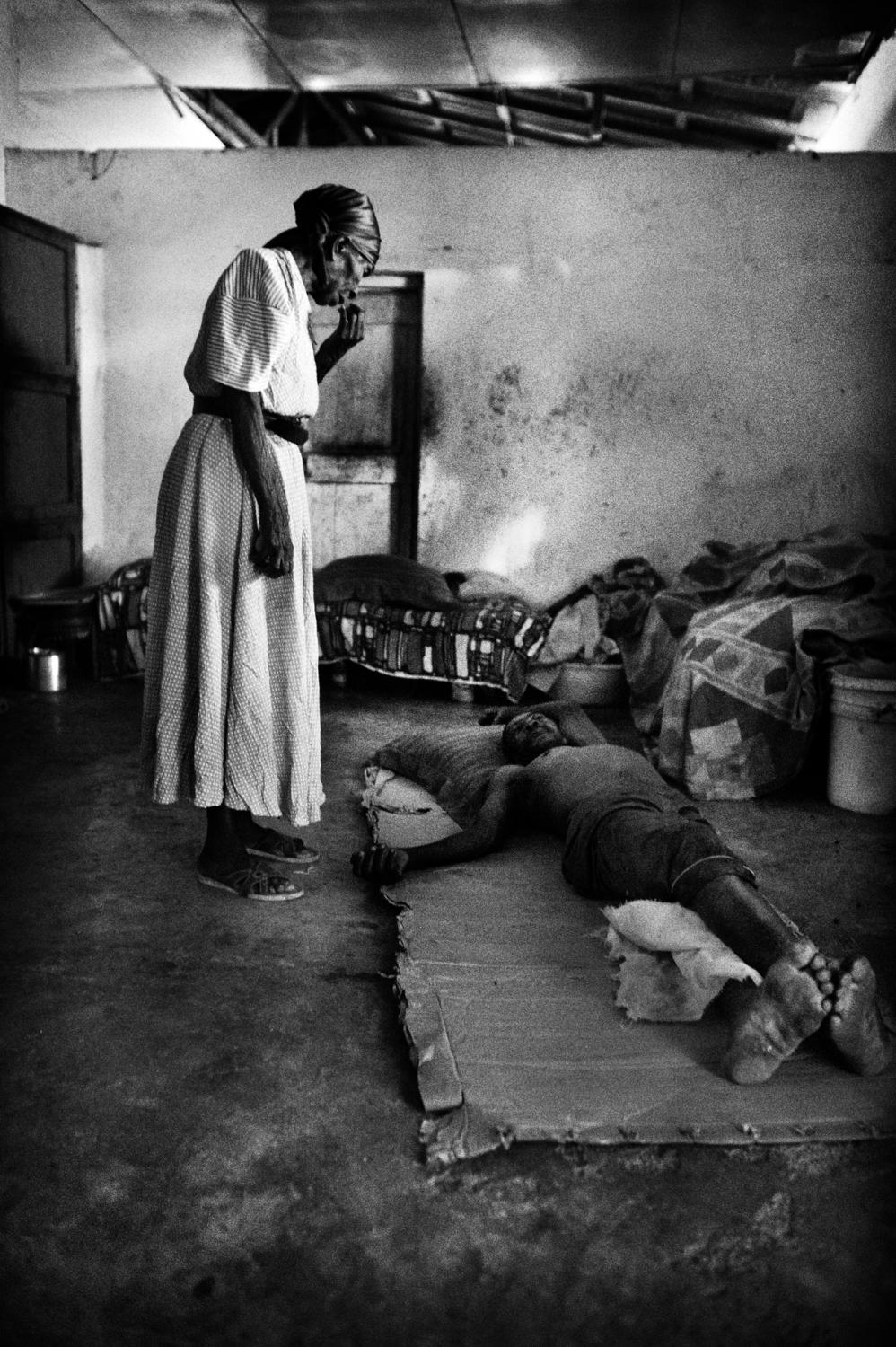 Hospice/ Haiti - Petit Guave, Haiti.
June 2010.
An inmate lying on the...