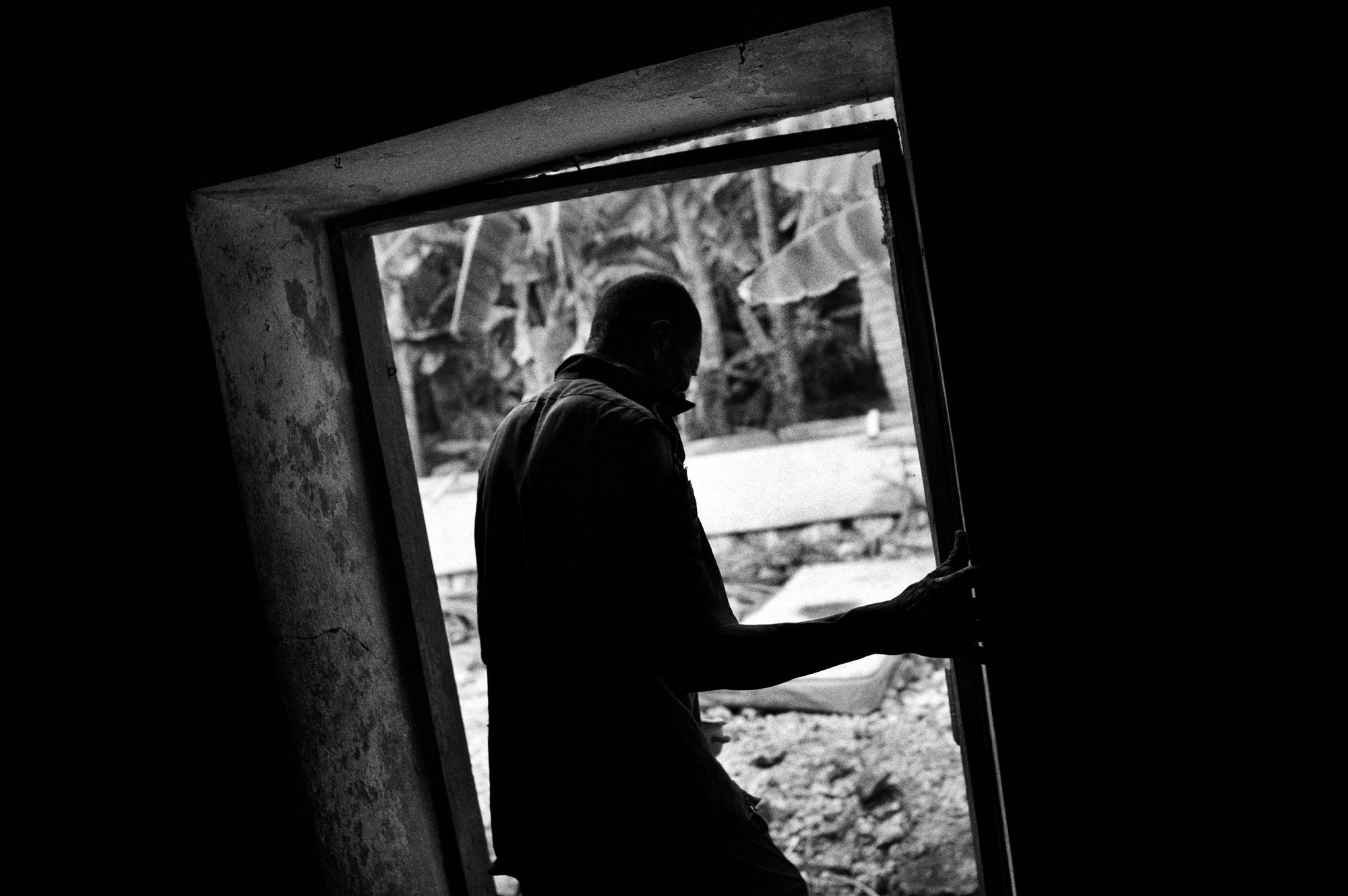 Hospice/ Haiti - Petit Guave, Haiti.
June 2010.
An inmate in a hospice...