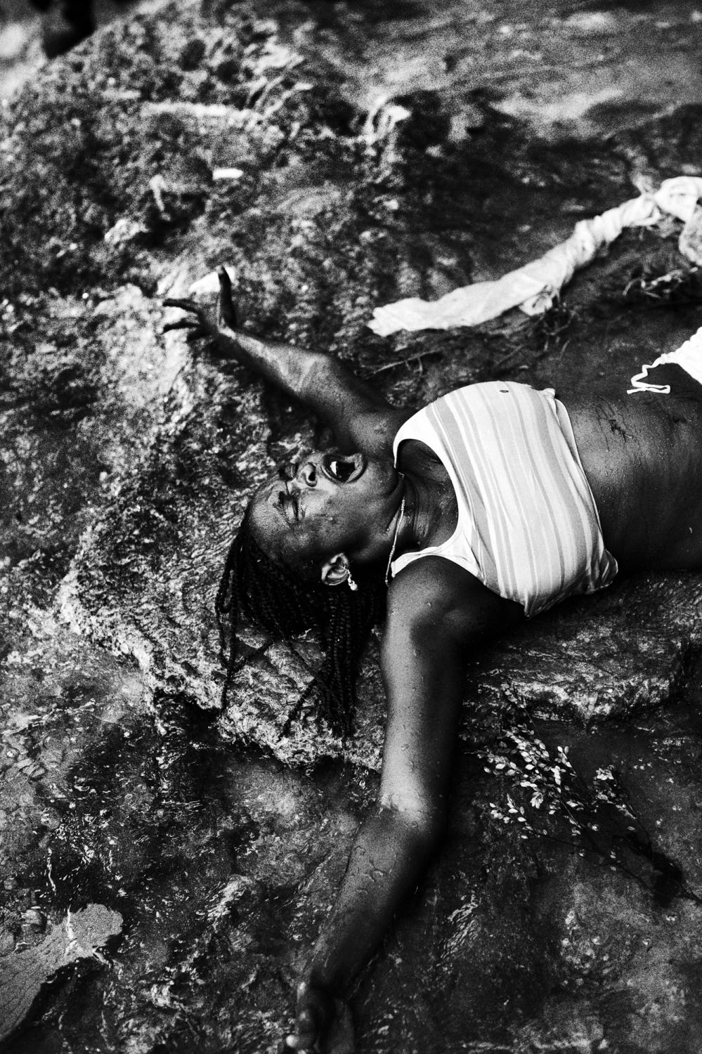 Saut dÂ´eau - Ville Bonheur, Saut Deau, Haiti.June 2010.A woman...