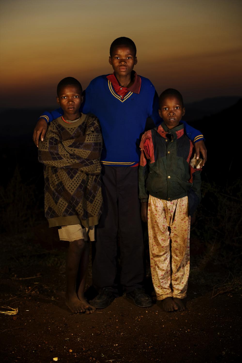 SwazilandÂ´s orphans  - Hosea, Swaziland.
Themba, Phila i Mhleli, The parents...