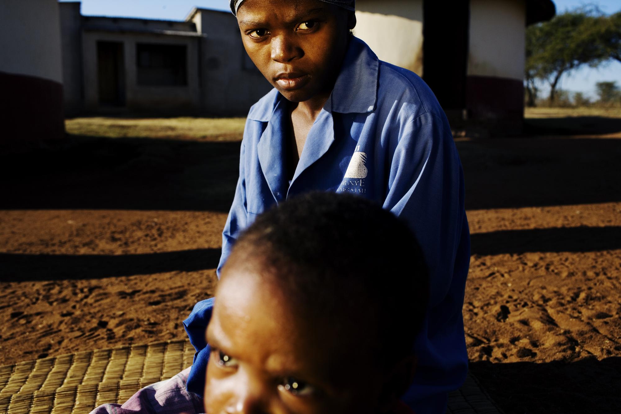 SwazilandÂ´s orphans  - Swaziland, Mbangazuwe.
Mother and child both HIV+ and on...