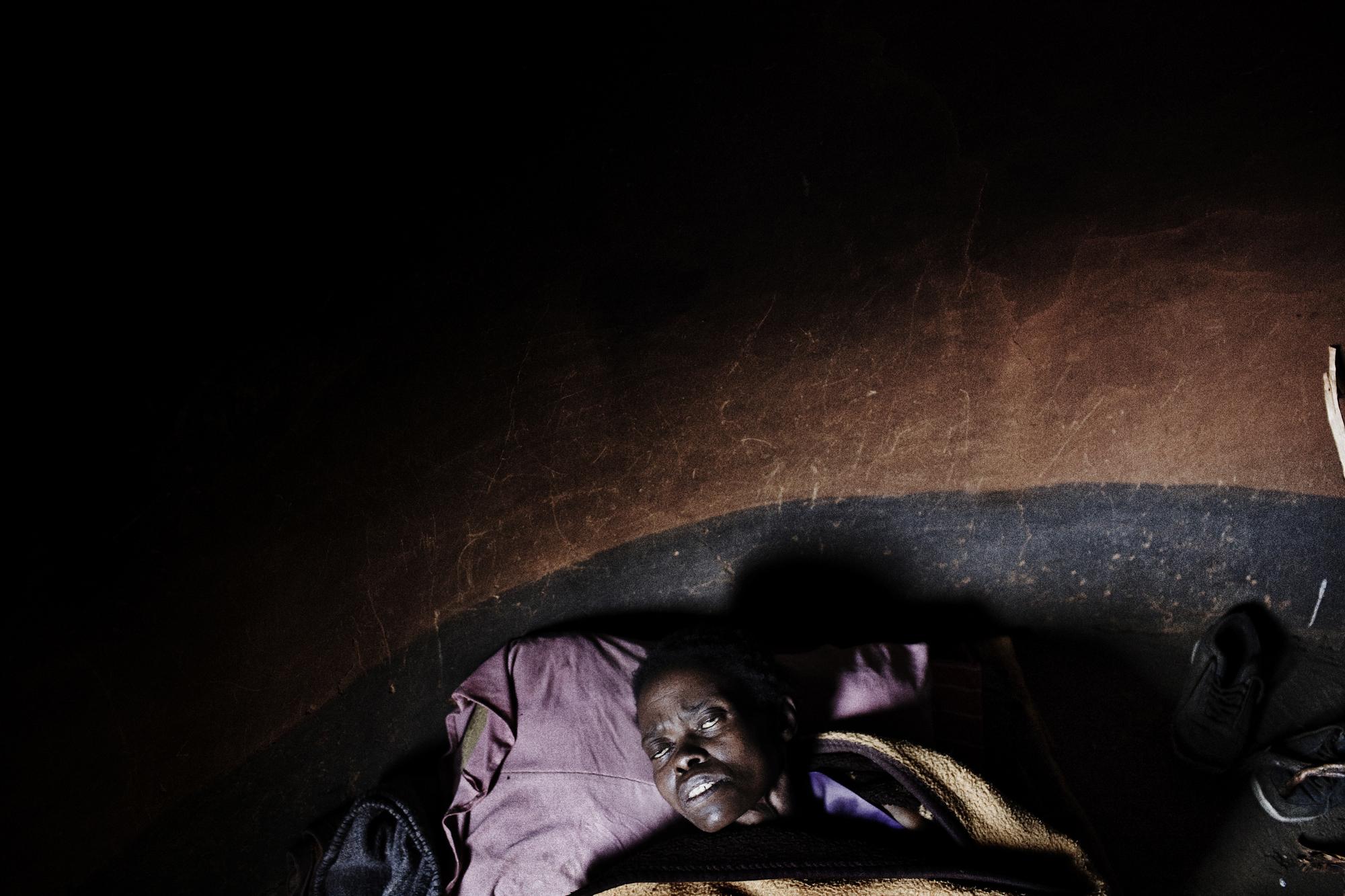 Tuberculosis / Lesotho - Lesotho.
Matseliso Makhaleme is lying on the floor...