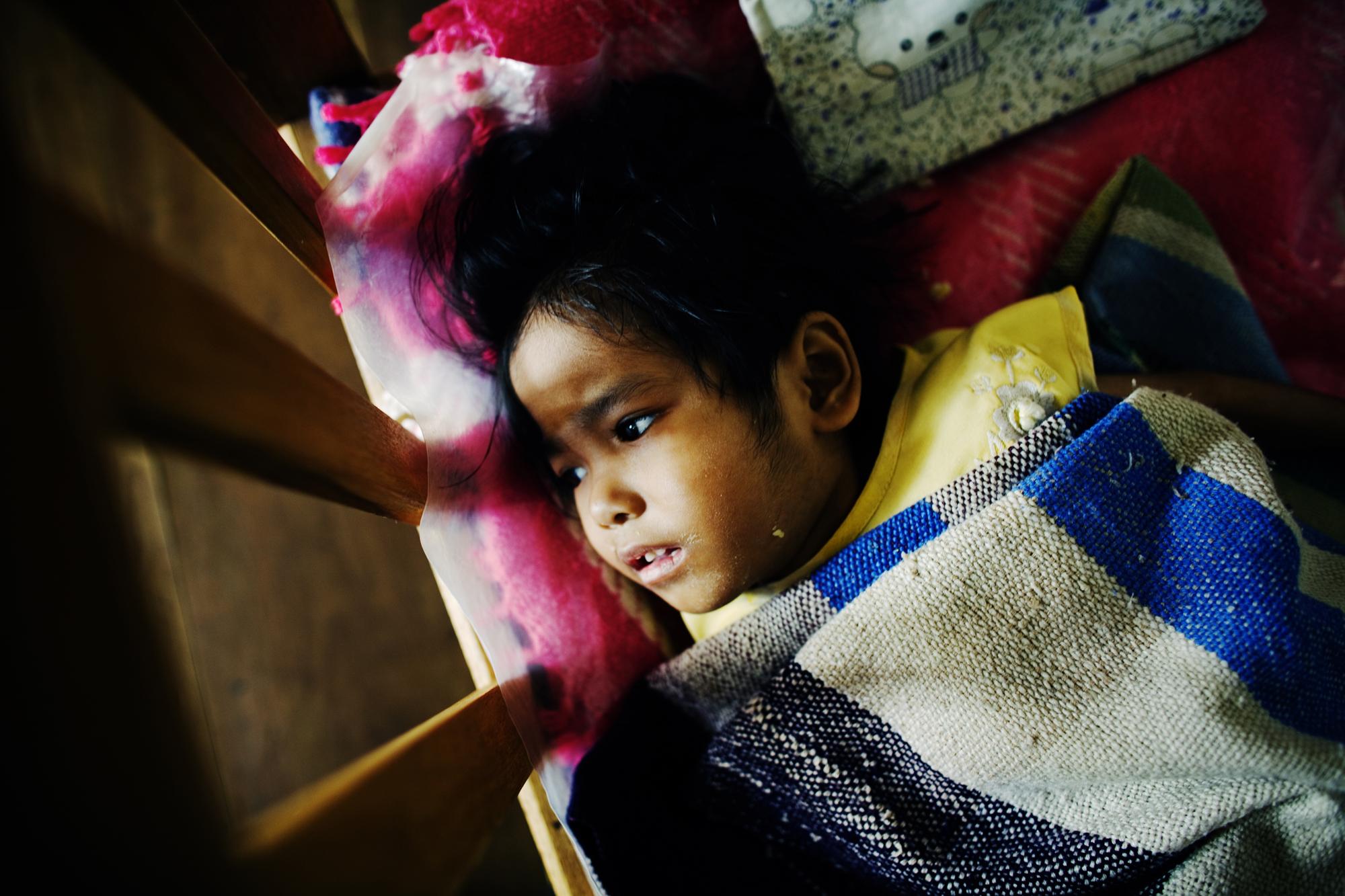 Injecting death - INDIA Aizawl, Mizoram Biakteni, a seven-year-old girl, at...