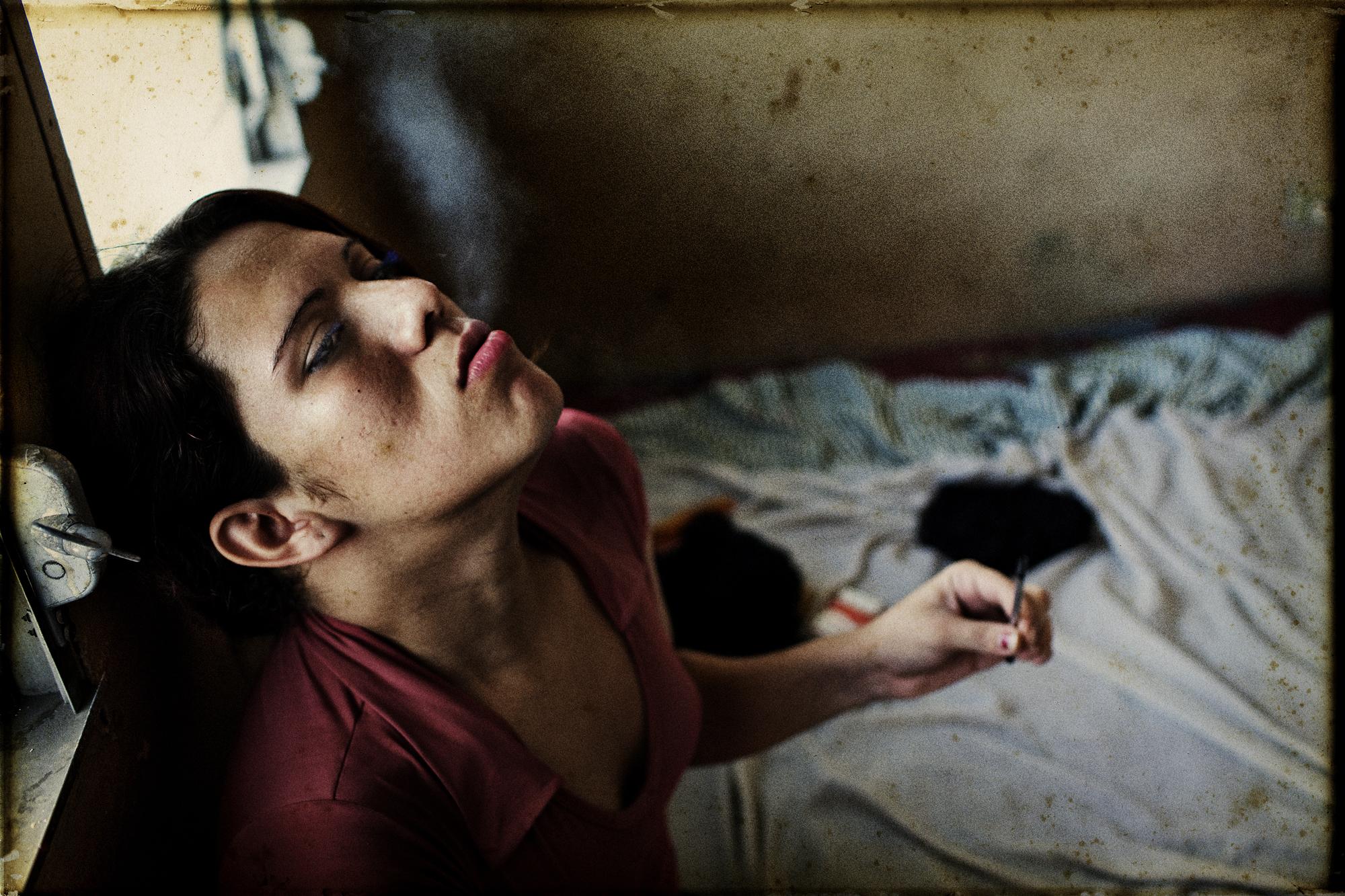 Forced identity - San Pedro Sula, Honduras. May 2008. Deylin at her hotel...