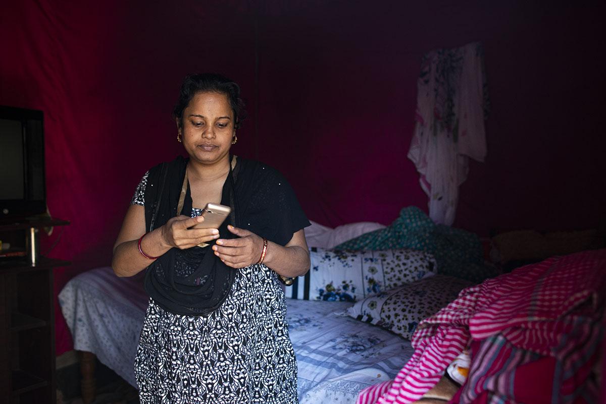 Rebeka, 28, is a sex worker who is eight months pregnant and lives in Daulatdia a brothel in...