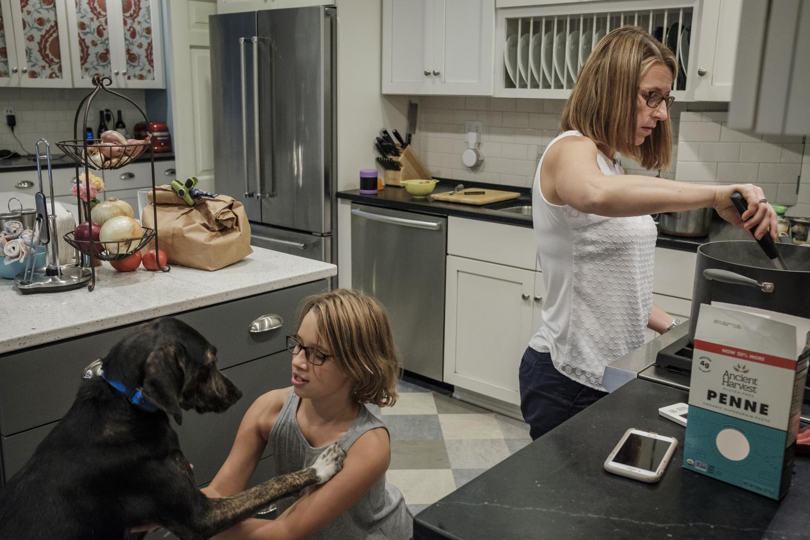 NPR - Jeri Seidman cooking dinner while her daughter Hannah...