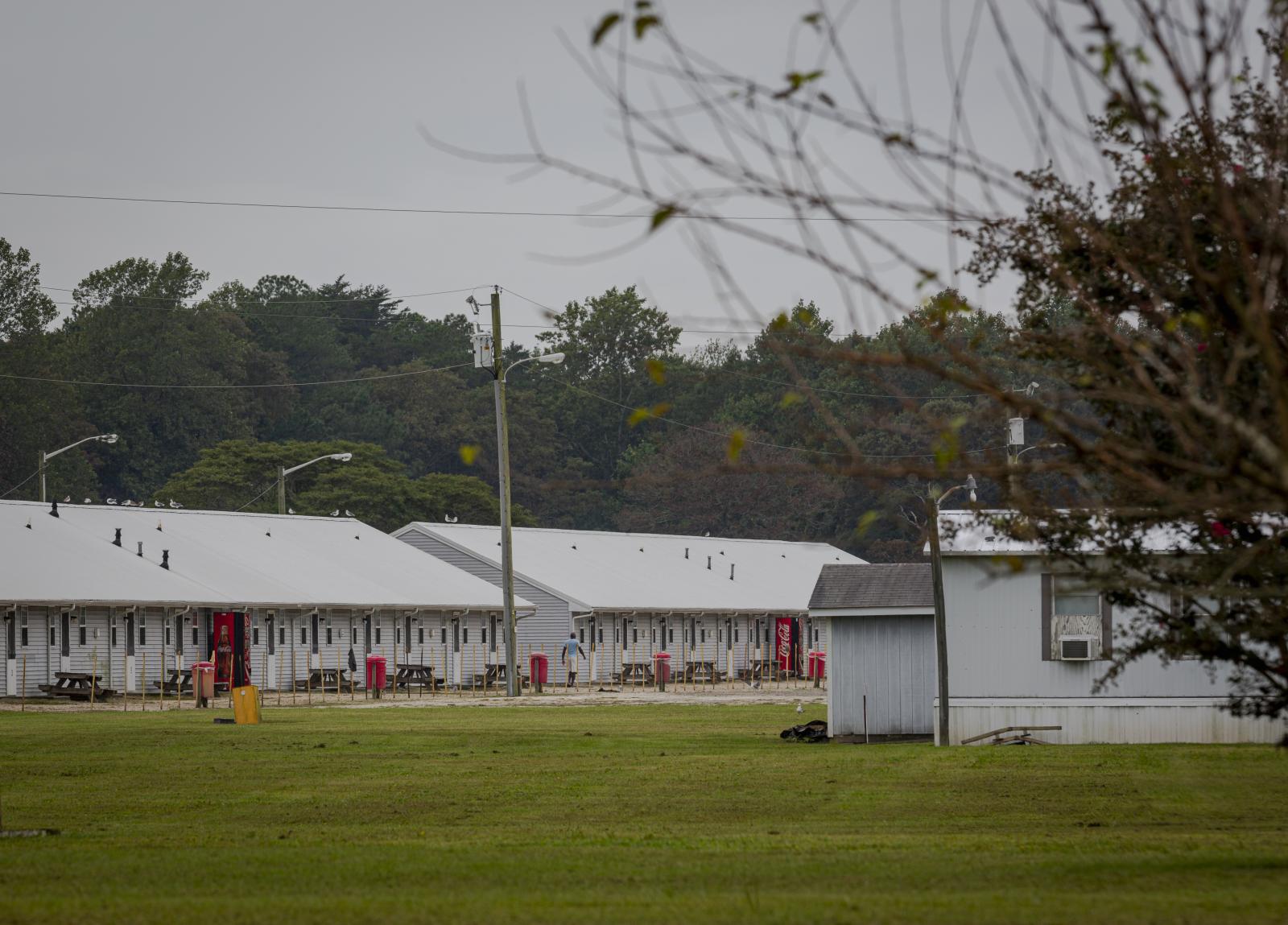 Migrant Workers Restricted to Farms Under One Growers Virus Lockdown - CHERITON, VA - September 26, 2020: Barracks where...
