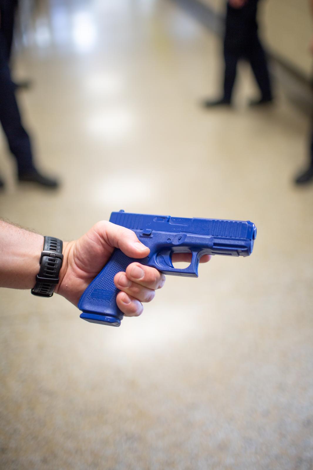 HELL DRILL * Warning* - An officer displays a "blue" replica handgun...