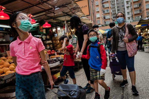 Singles  - HONG KONG - FEB 2020 Residents wear face masks while...