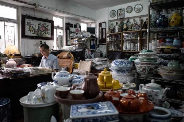 Singles  - HONG KONG - SEPT 2020 Joseph Tso hand-paints porcelain...