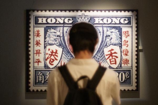 Singles  - HONG KONG - OCT 18, 2020 A visitor stands in front of a...