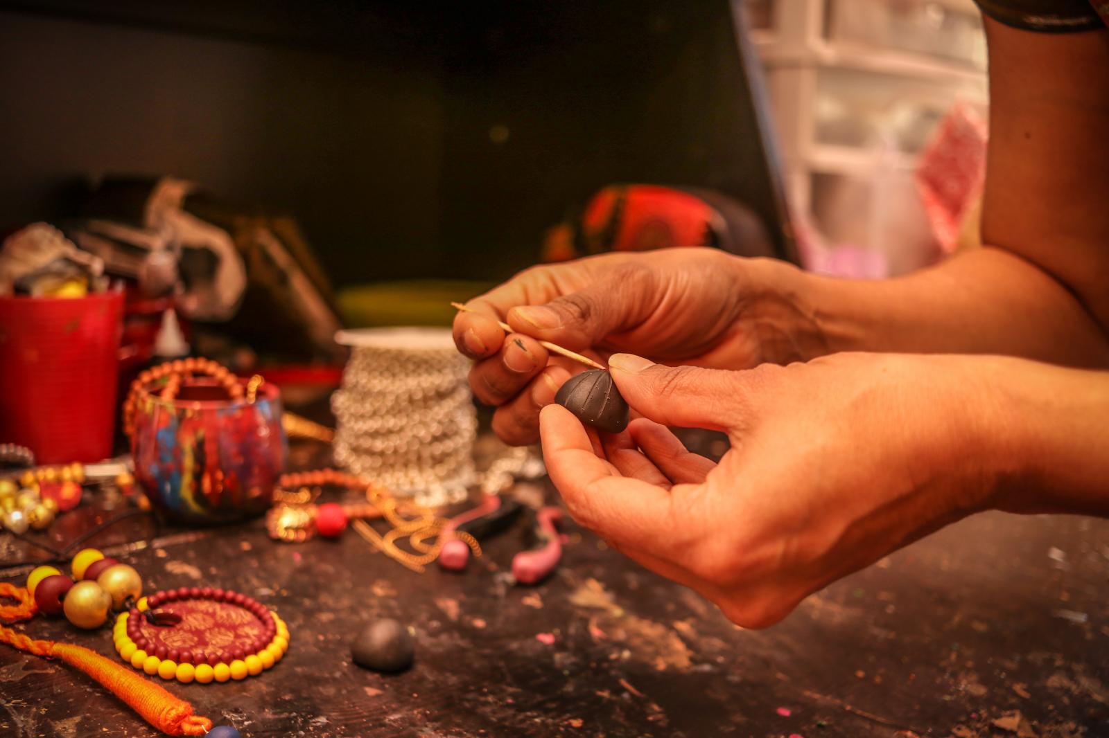 Vani Haridas makes clay earring...if., on Saturday, Dec 14, 2019.