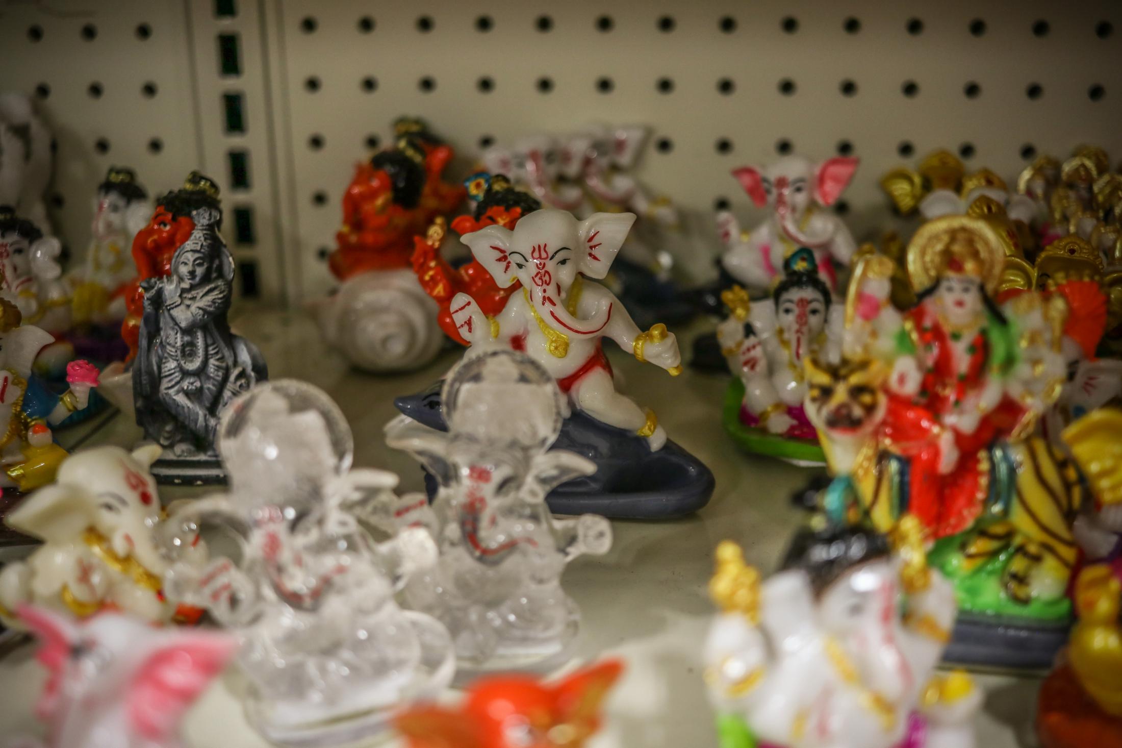 Spices Store - Idols of Hindu gods at New India Bazar, Santa Clara,...