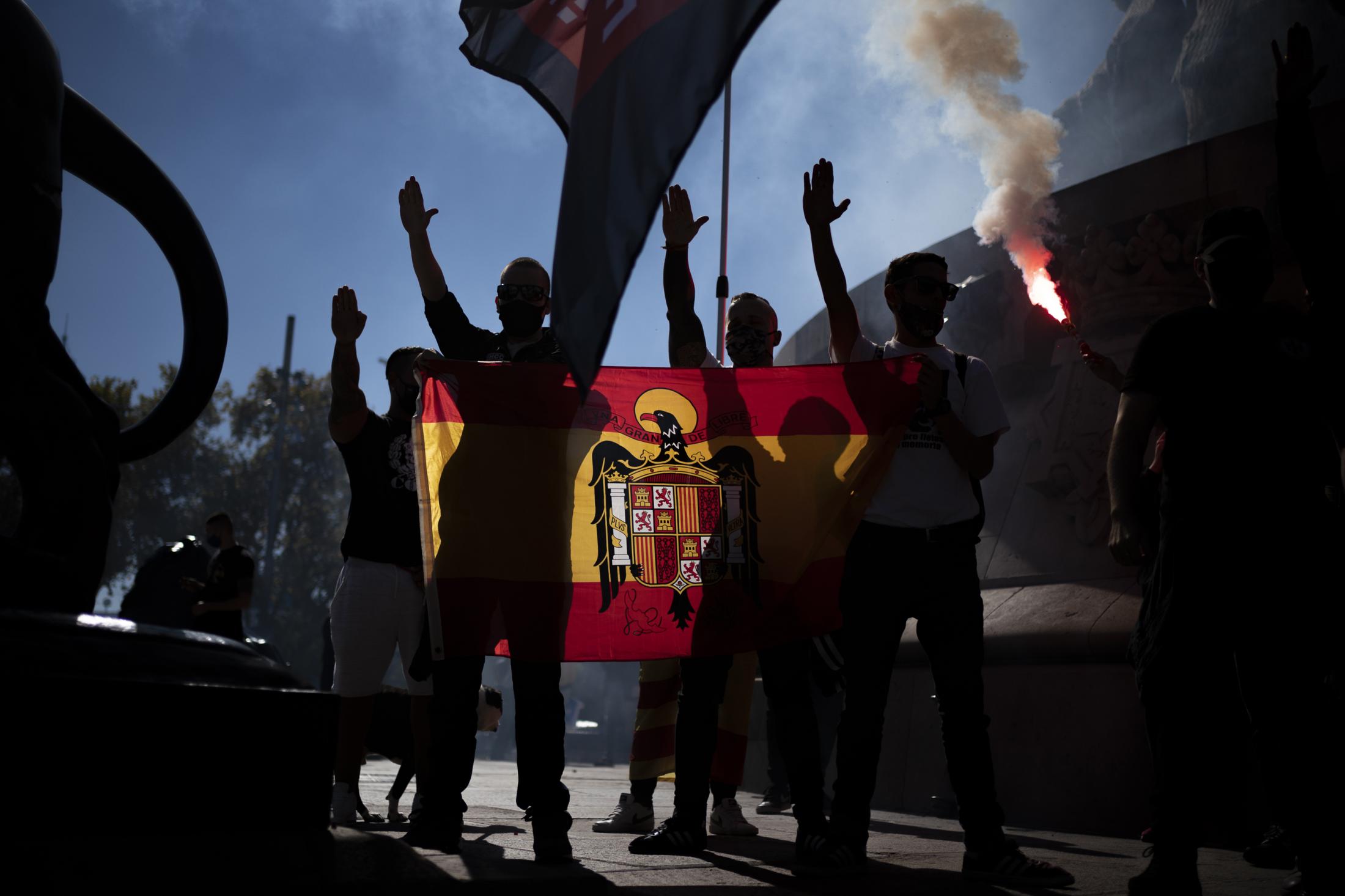 Singles -  Ultra right wing demonstrators burn Catalan independence...