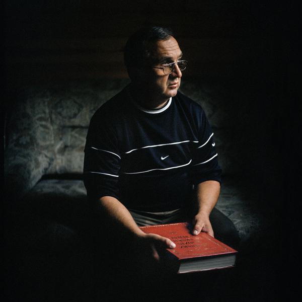 Image from Portraits - Adam Iljasiewicz at his home in Kruszyniany holding the...