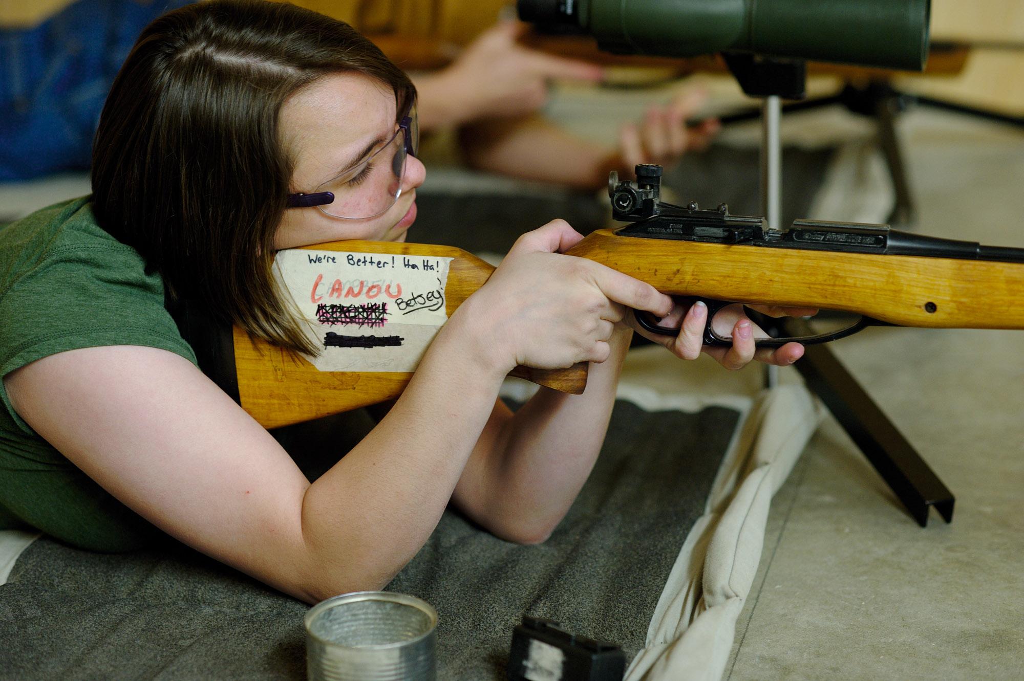 Cadets - Jenna, member of the Rifle Team, shooting a match....