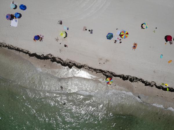 FLORIDA, USA - JUNE 10: An aerial drone view of the beach as Miami reopens beaches after measures against the novel coronavirus (COVID-19) began to be lifted in Miami Beach, Florida, United States on June 10, 2020.