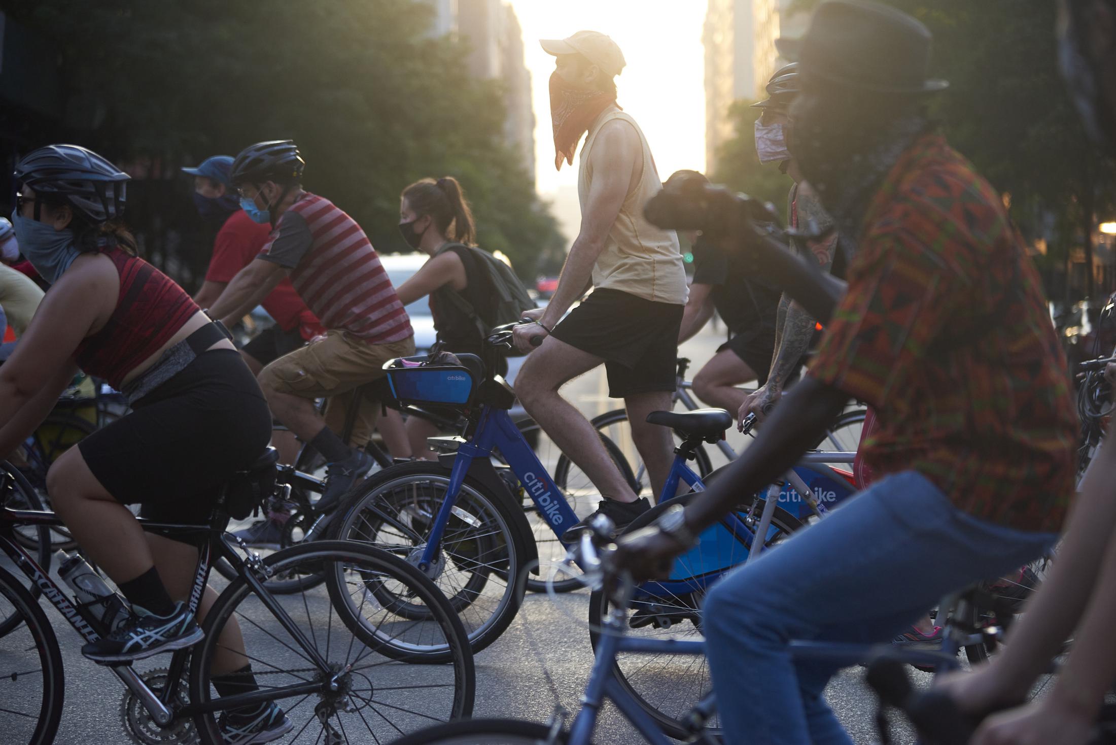 A group of cyclists is seen occupying the streets of Manhattan, on a new protest day in support...