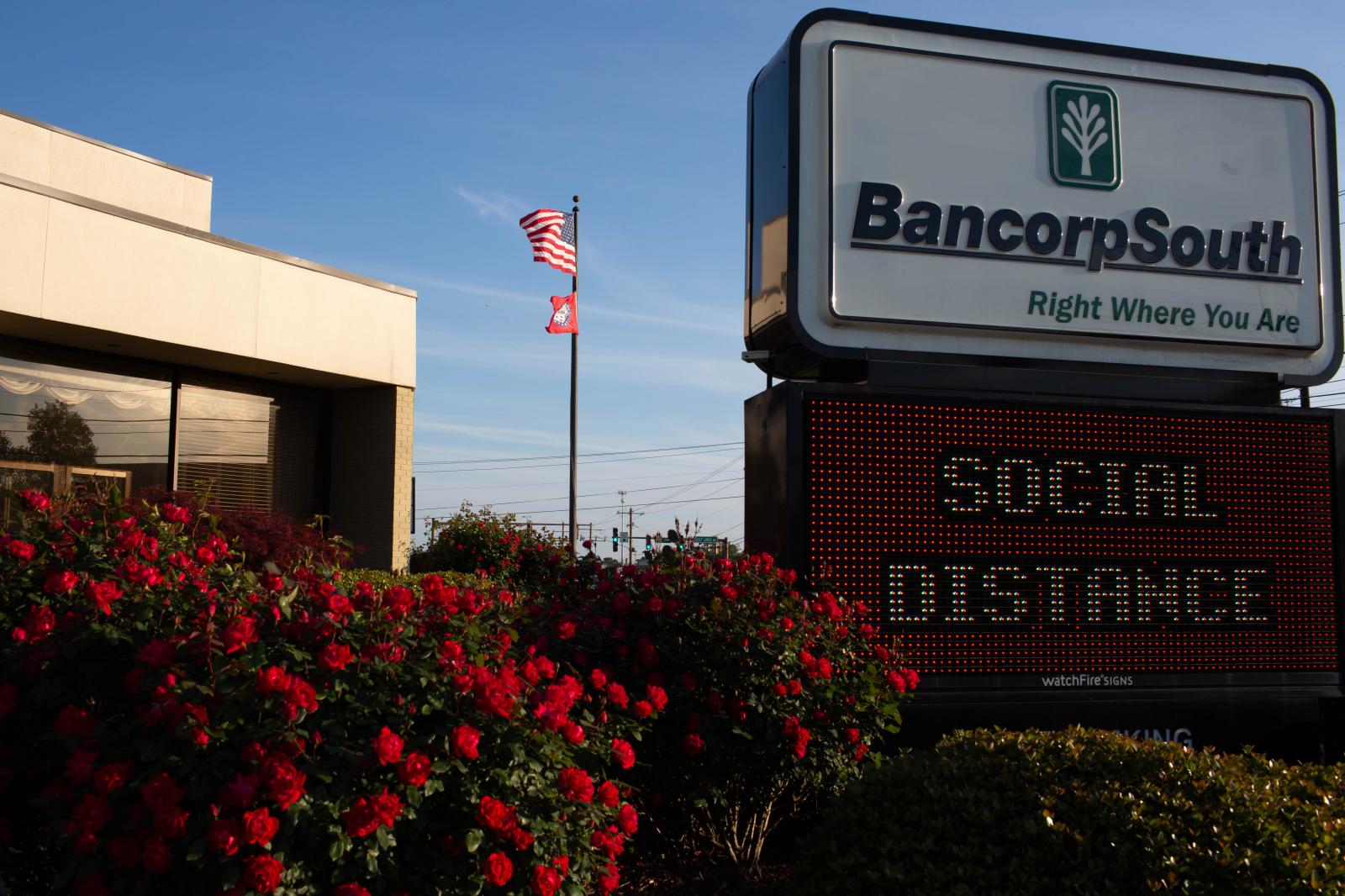 Banks signs promote social dist...gs, Arkansas on April 20, 2020.