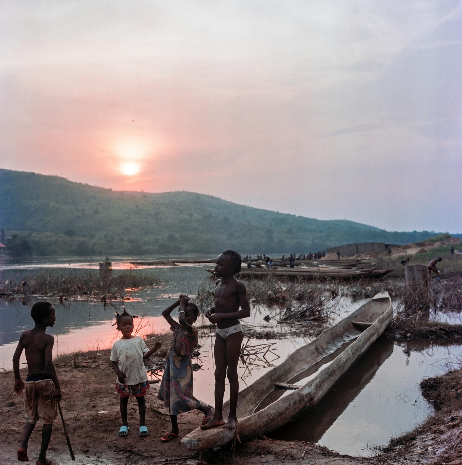 War Crimes - Sunset on Ubangui river overlooking Congo DRC