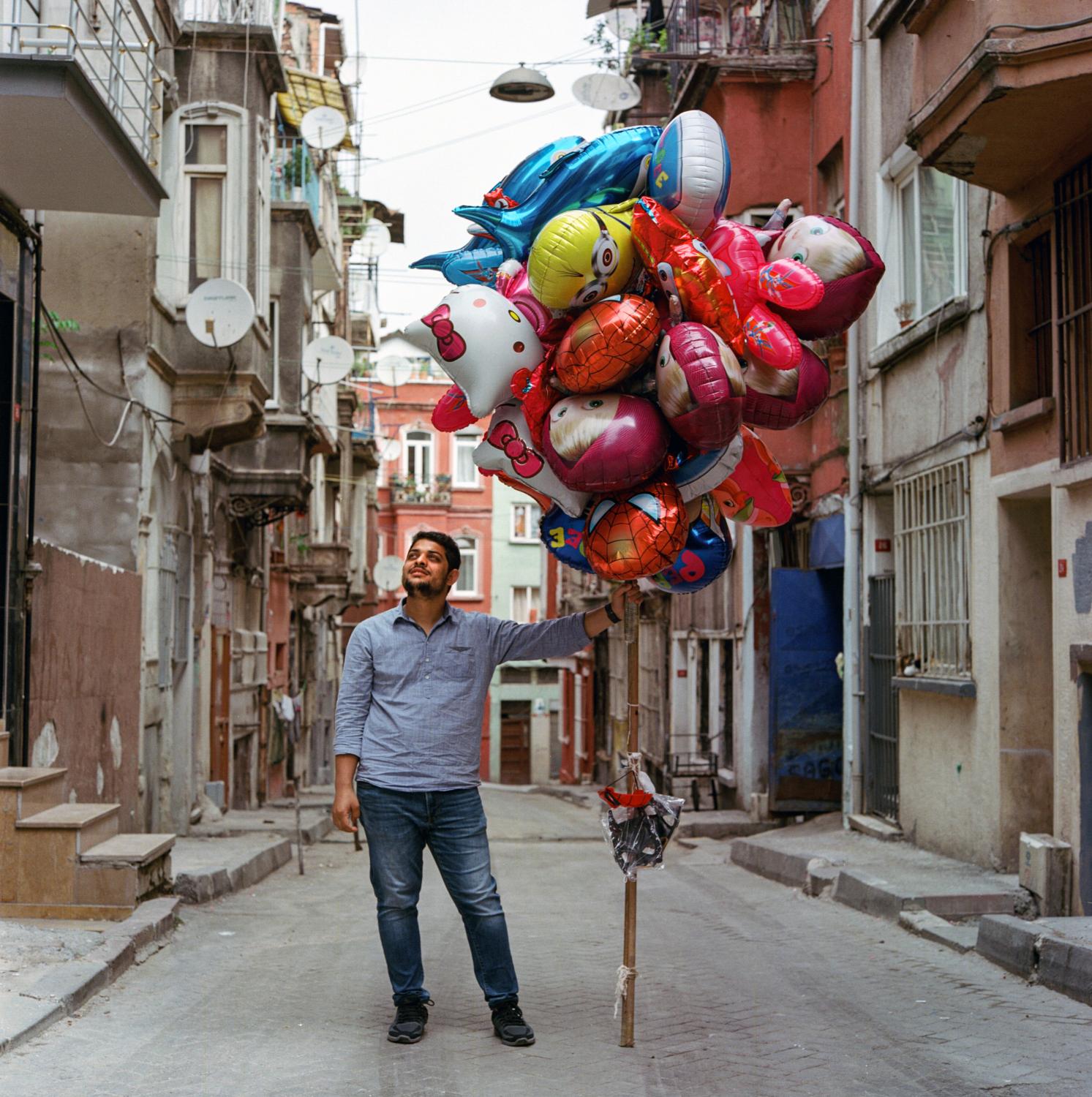 Istanbul: A Lockdown Diary - Street Vendor - Balloons Ozgur FitirBoth Ozgur’s...