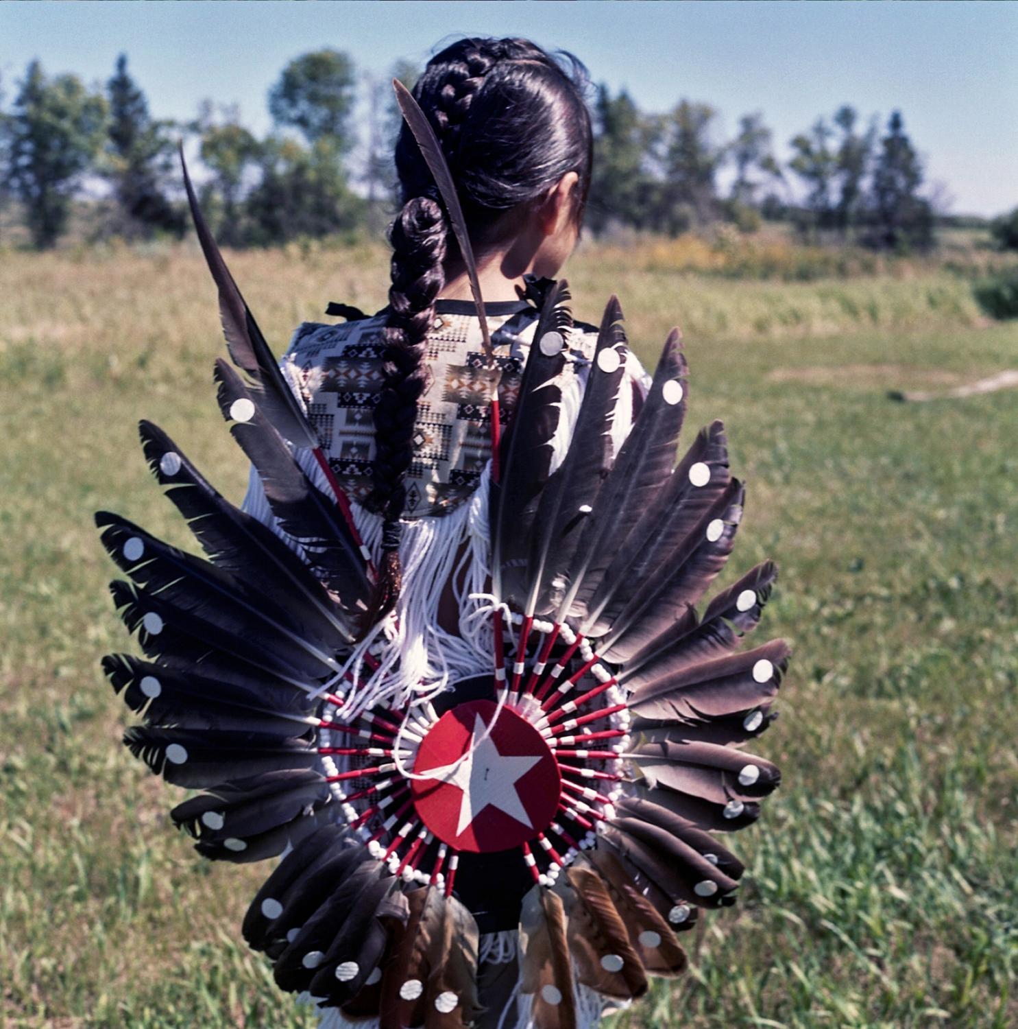 Spirit Lake - Boy dressed in his eagle wings Pow Wow dancer outfit. St....