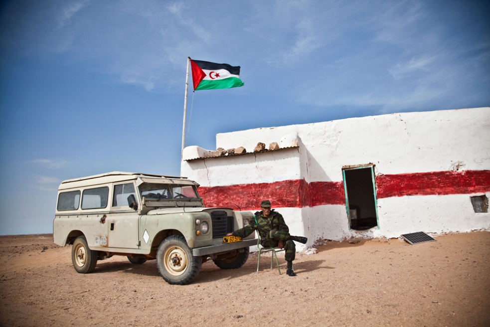 A Polisario guard sits at a desert outpost.