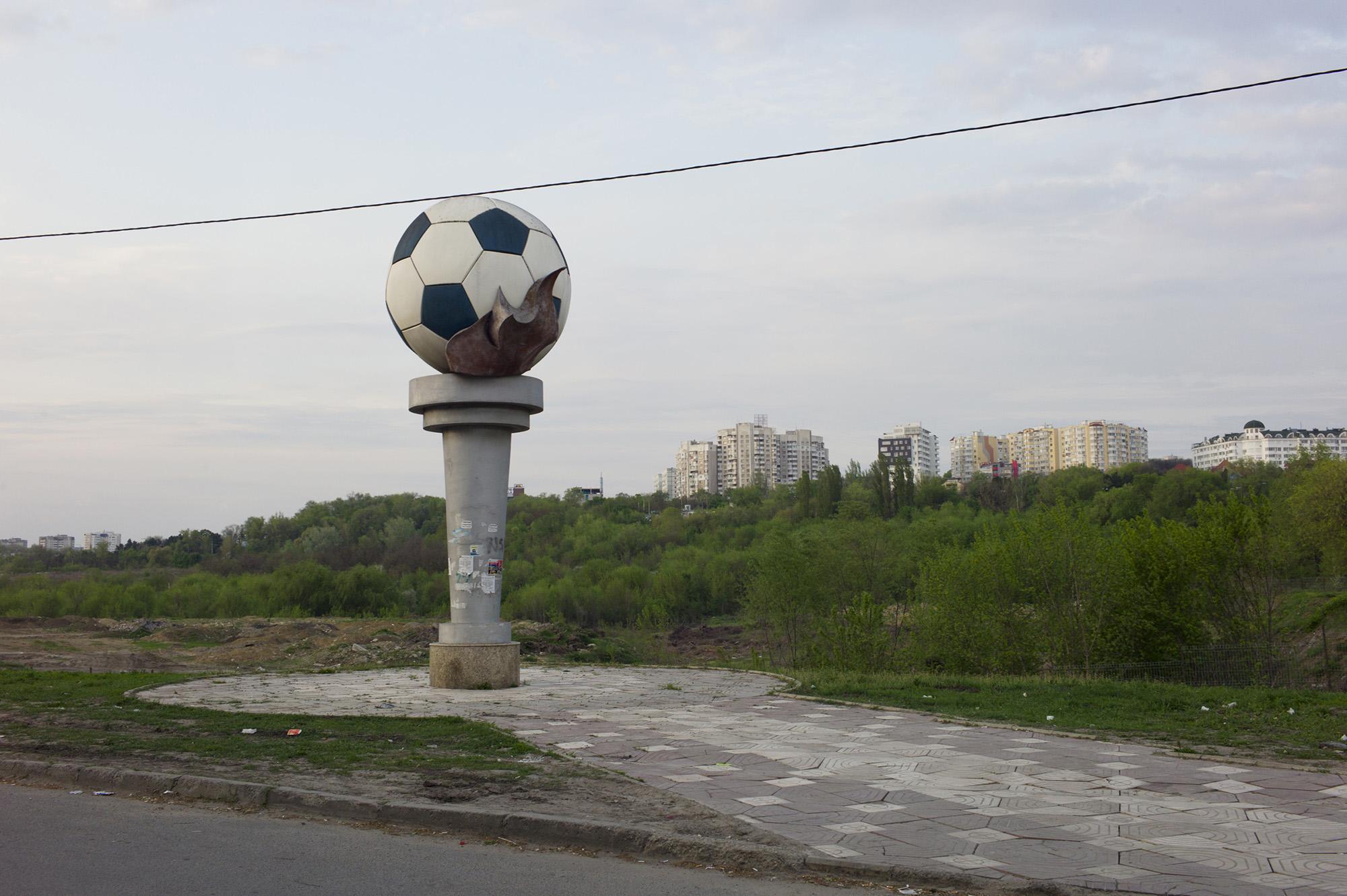 Republic of Moldova / Chisinau / Near the circus in Chisinau is a monument with a football which was built when in the area the construction of a new sport arena was planned. The old, architecturally intresting Republican stadium of the city had then already been demolished (in 2007), but even after other two different plots were assigned and many promising stadium projects, the ball is still on the pedestal, but no new stadium has yet seen the light anywhere in and around Chisinau.
