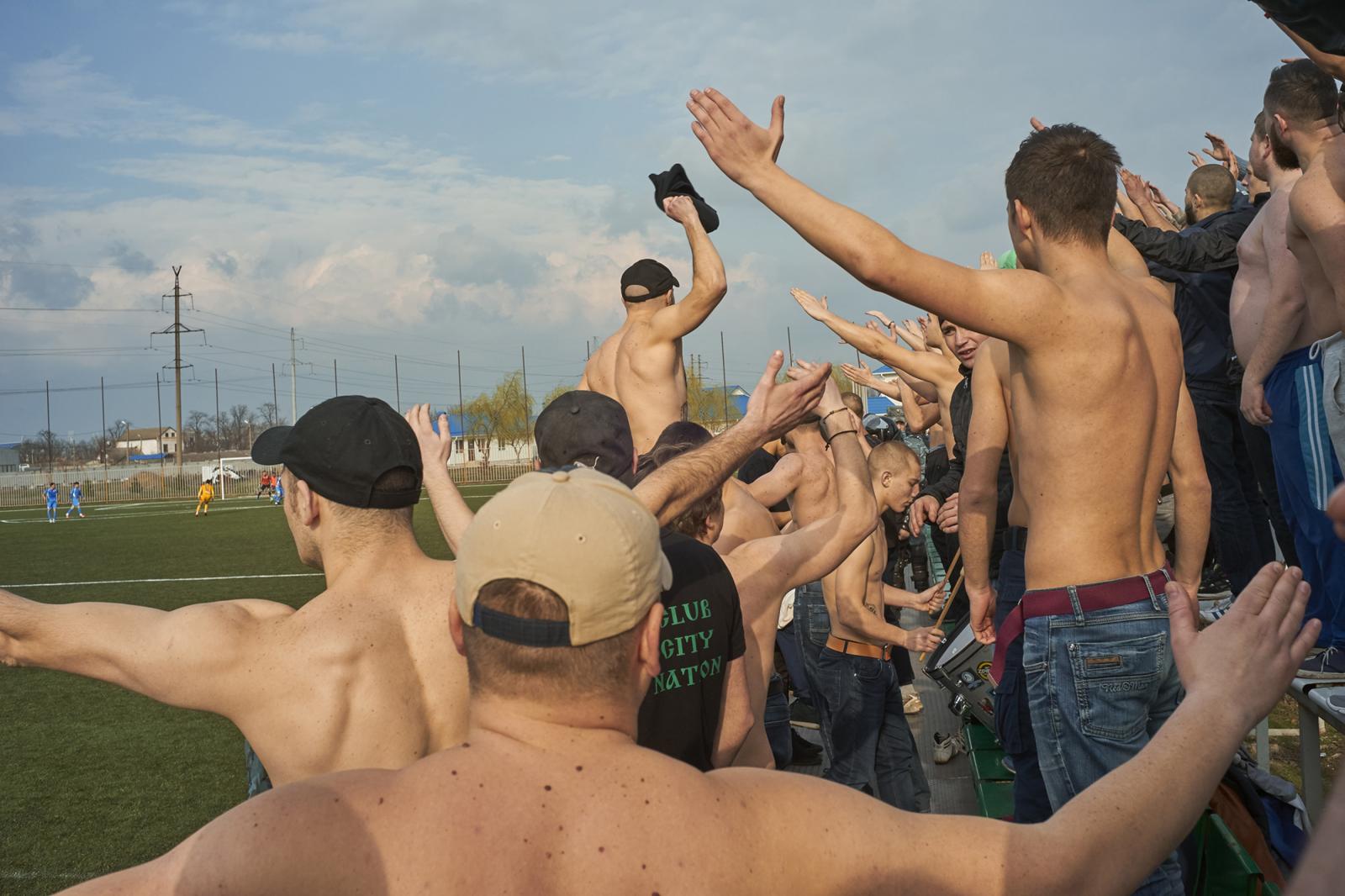 THE MOLDOVAN DERBY - Republic of Moldova / Transnistria / Ternovka / Some supporters of the FC Zimbru Chisinau sing...