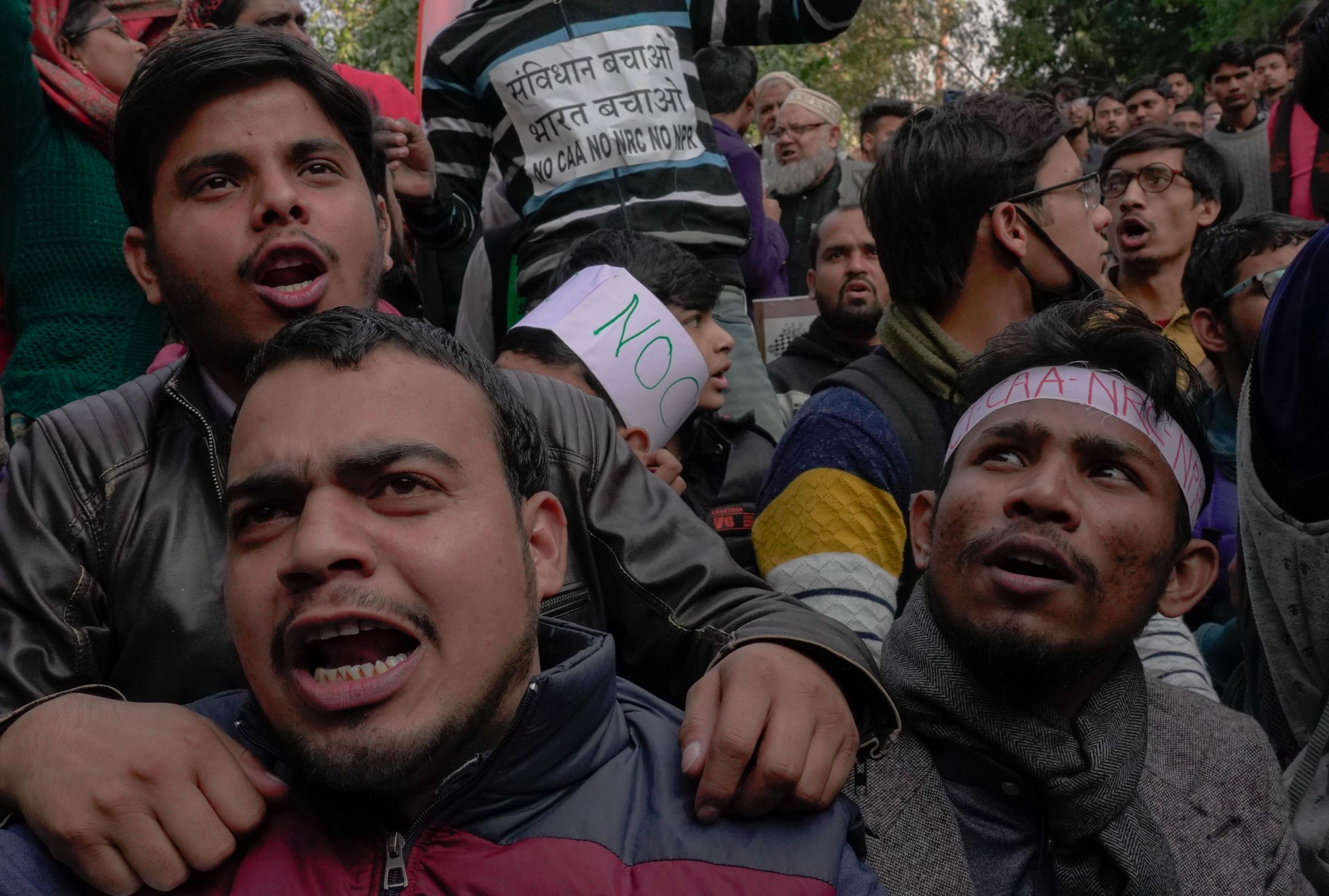 Aazadi - Anti-CAA protesters chant together at Jamia Millia...