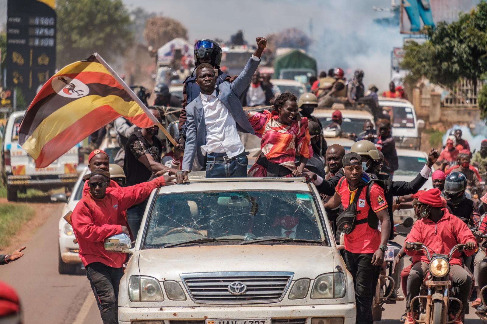 Bobi Wine greets supporters as ...has been in power for 35 years.