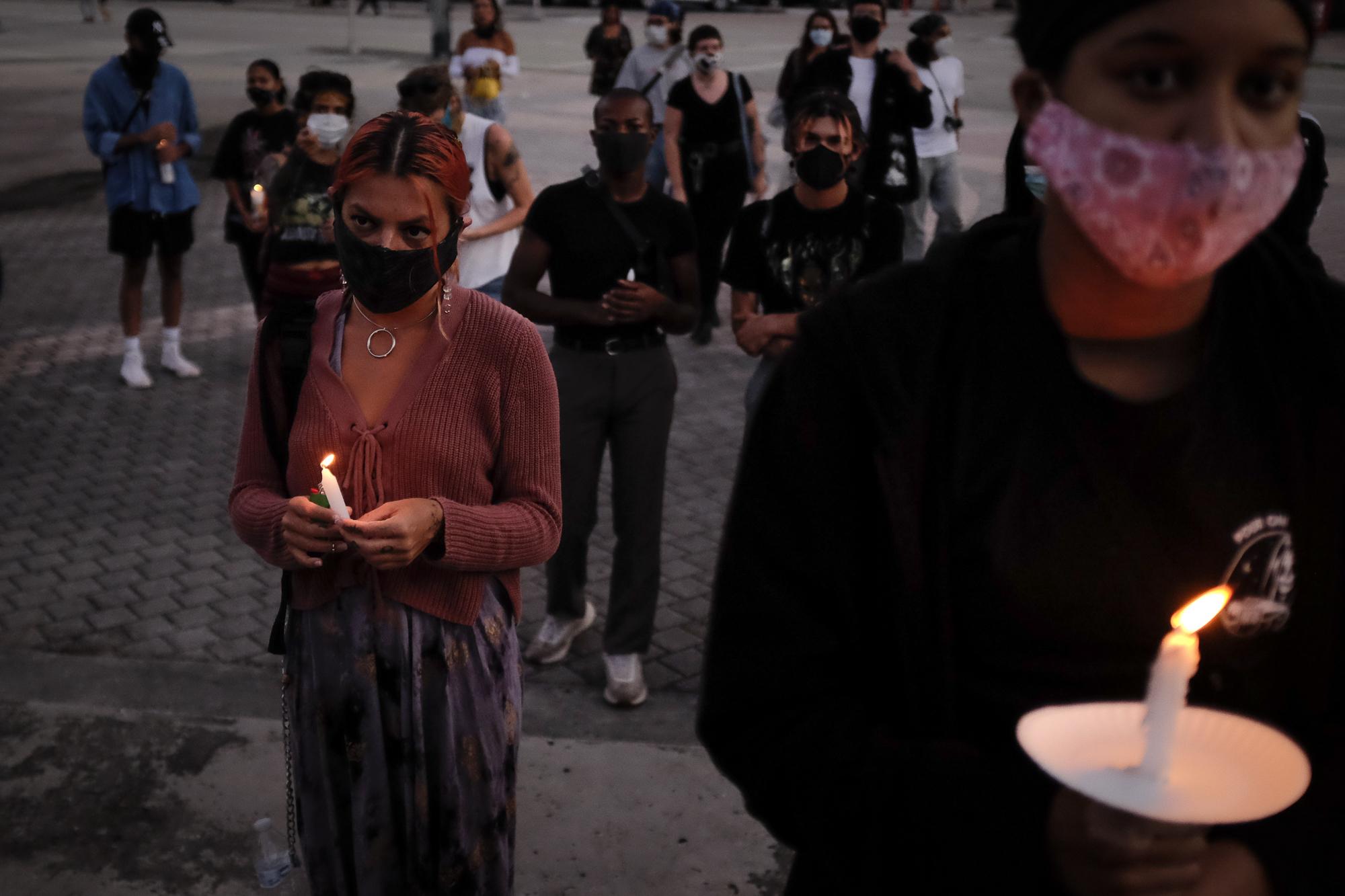 Vigil for Oluwatoyin Salau - People hold candles during a vigil for slain black...