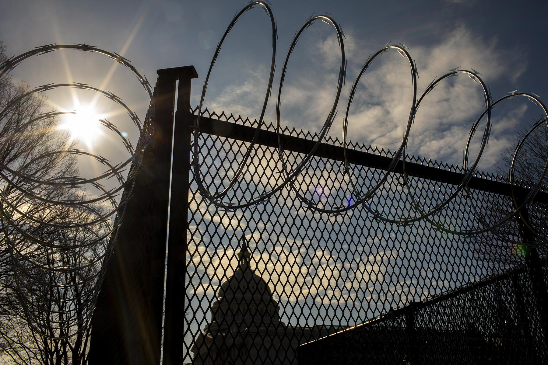 Protests, Pestilence & Politics - The fence with razor wire around the Capitol campus.