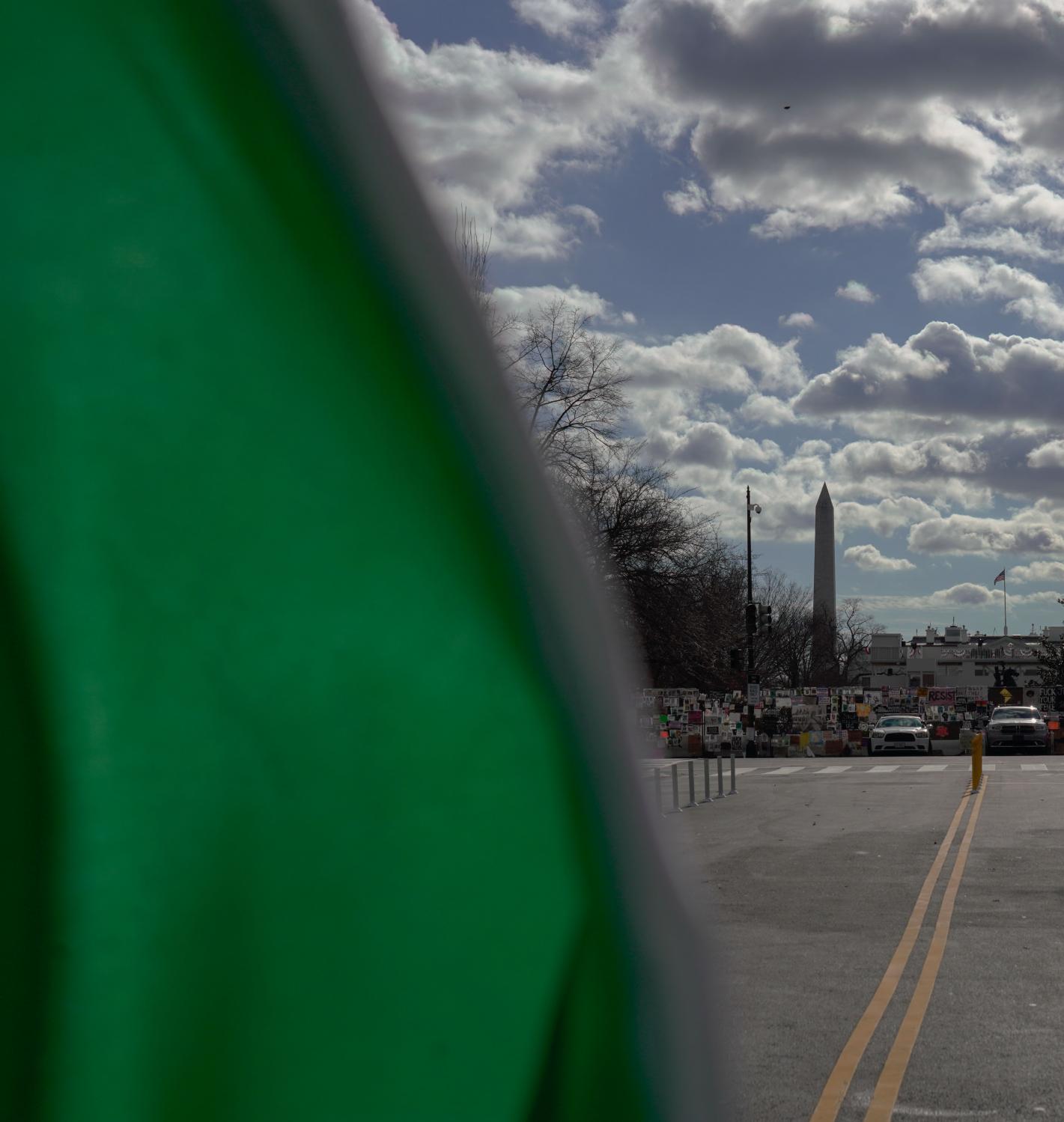 Occupied - A Back Lives Matter flag waves near the White House on...