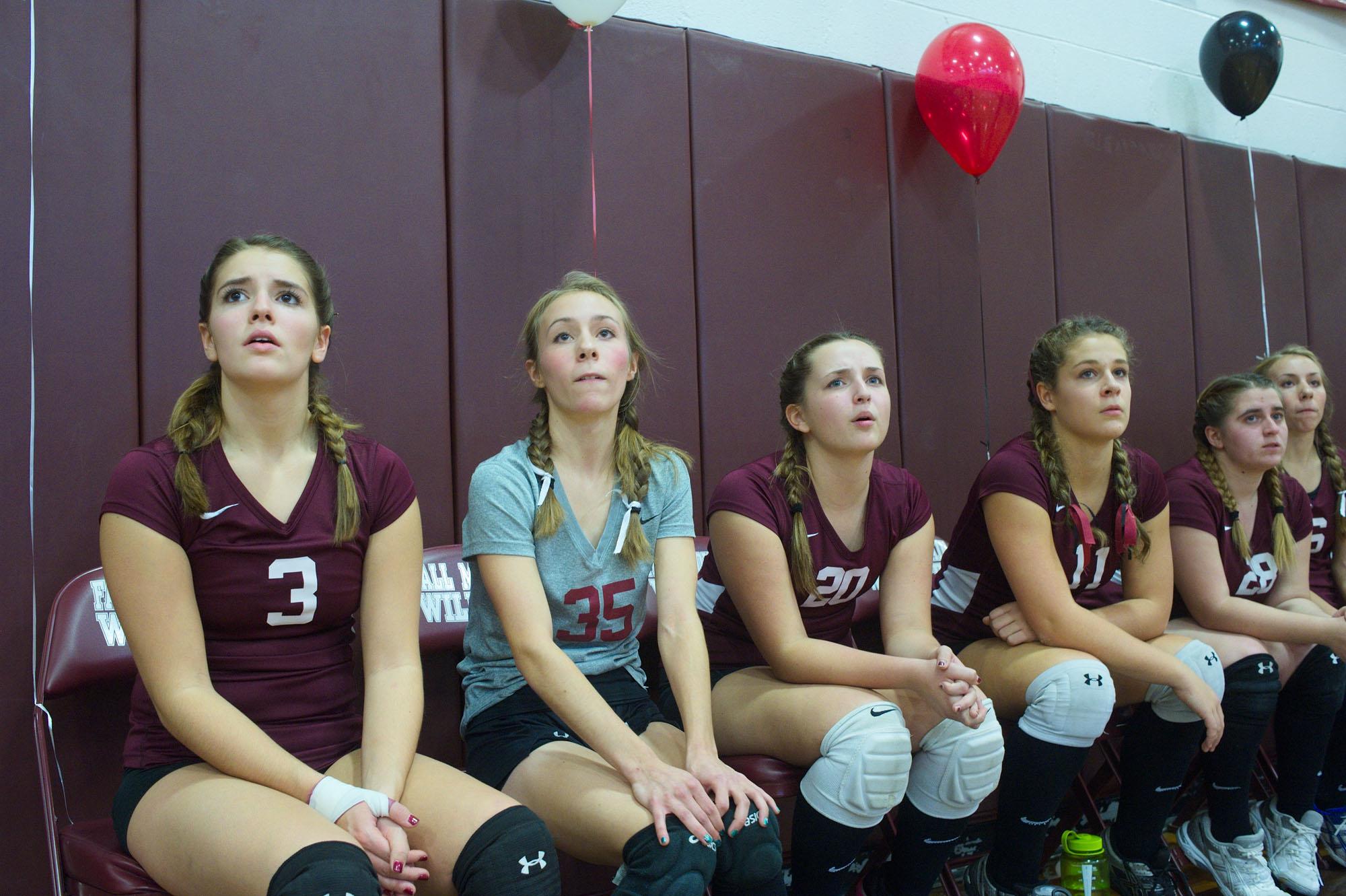 You'll Hear Us Roar - Members of the Varsity Volleyball Team follow the...