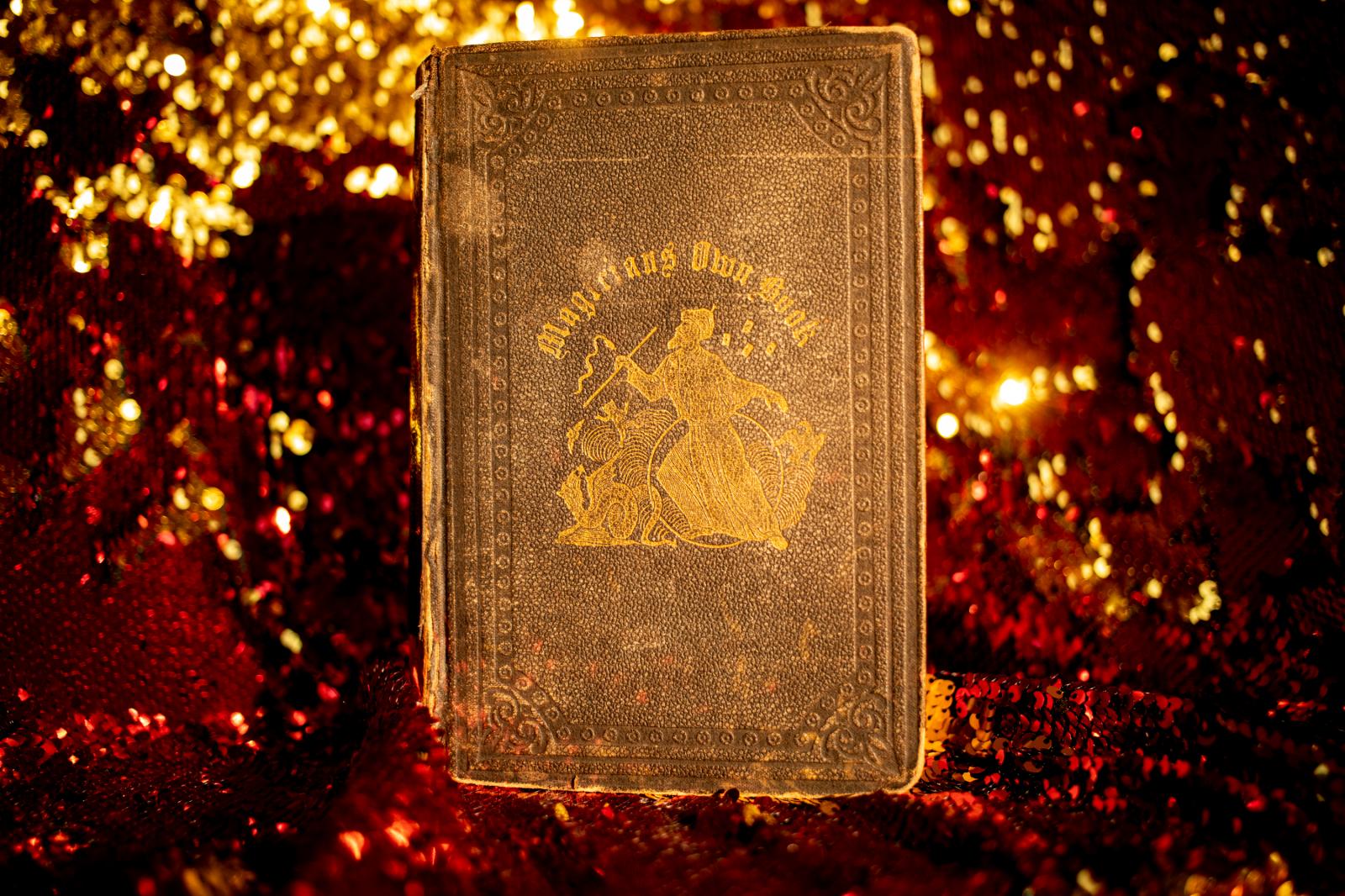  An old magic book that belongs...d gave it to her as a present. 