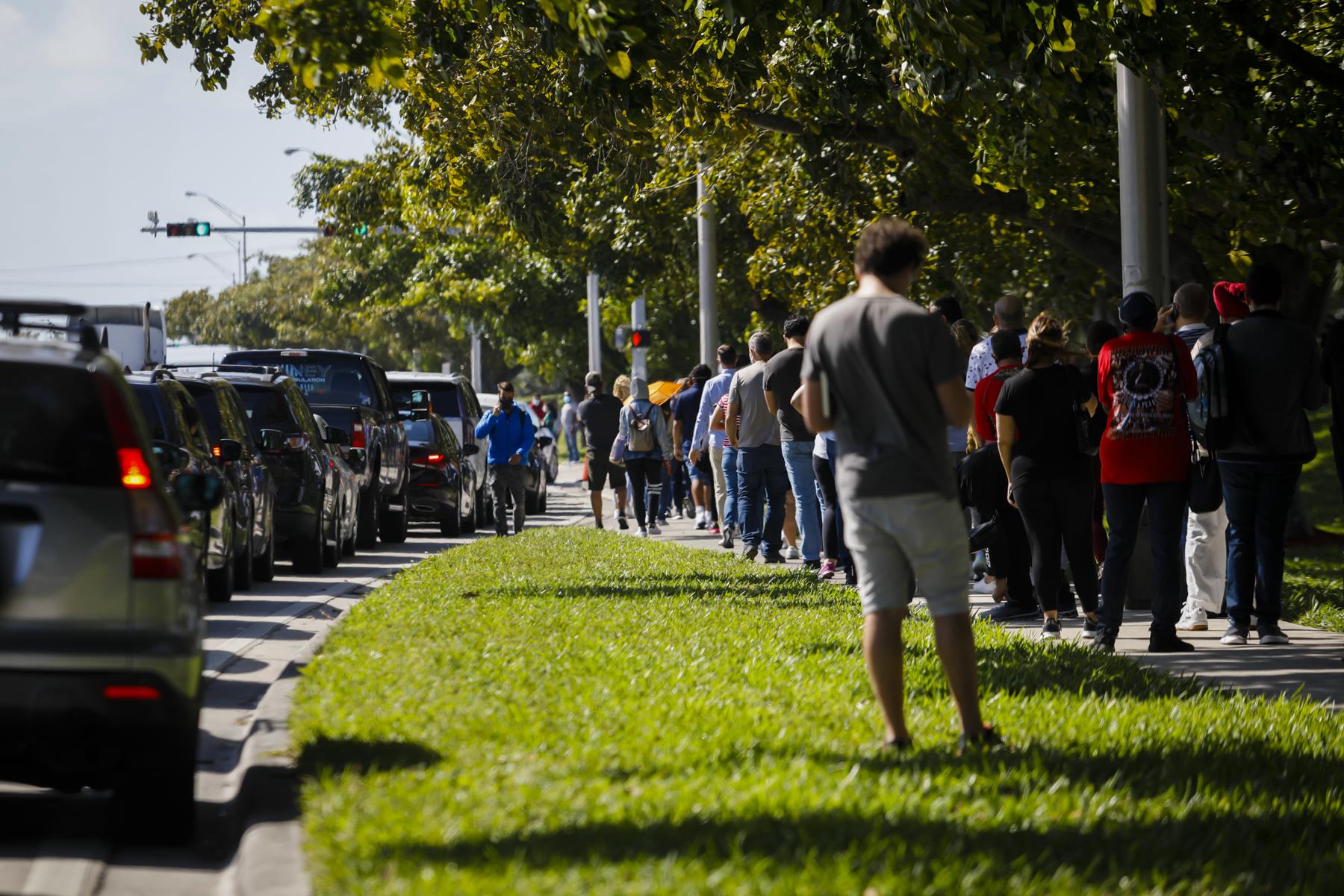 FEMA vaccination facility in North Miami - People wait in line to get the COVID-19 vaccine in a...