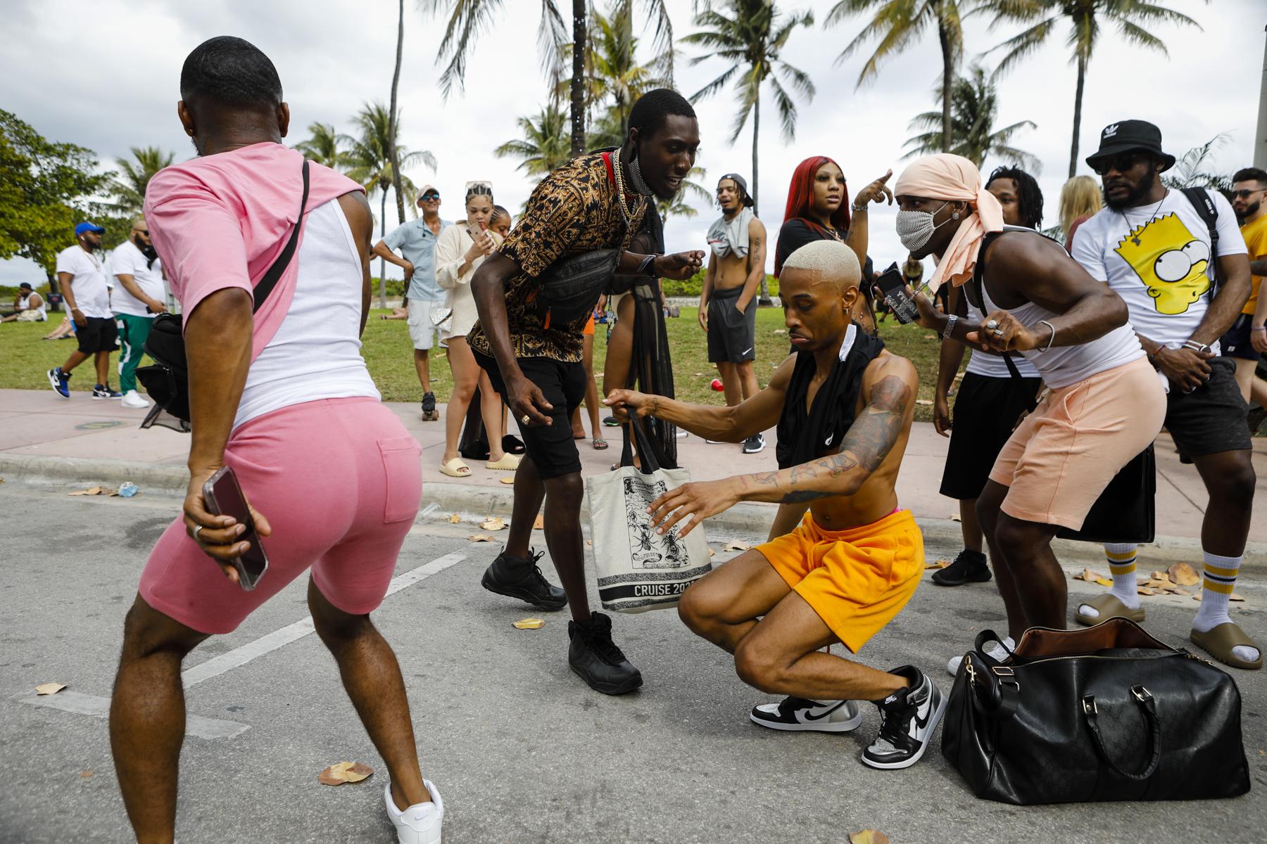 2021 - Spring Break @ Miami Beach - People dance in the streets during Spring Break in Miami...