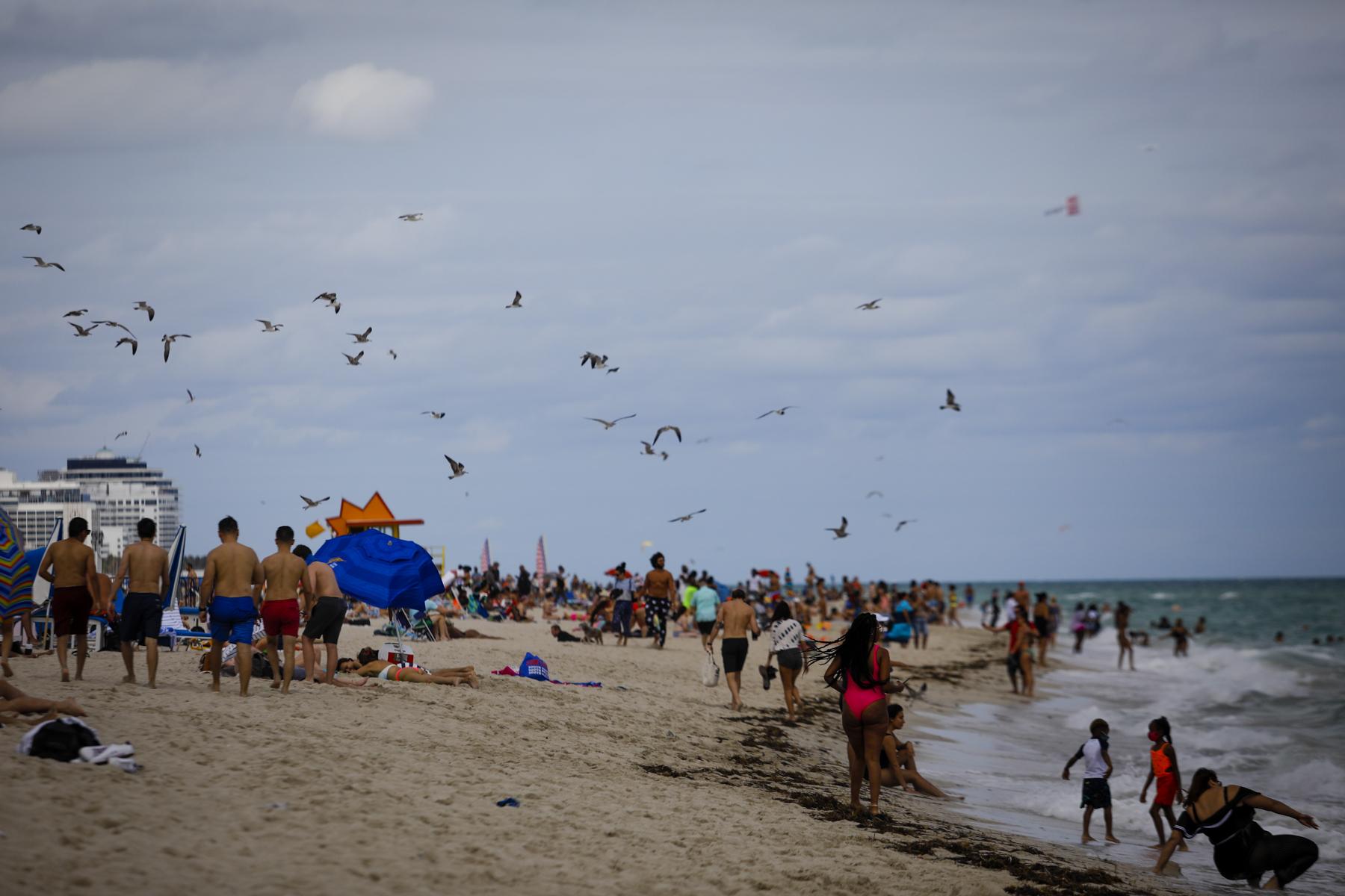 2021 Spring Break @ Miami Beach - Tourists are see on the beach during Spring Break in...