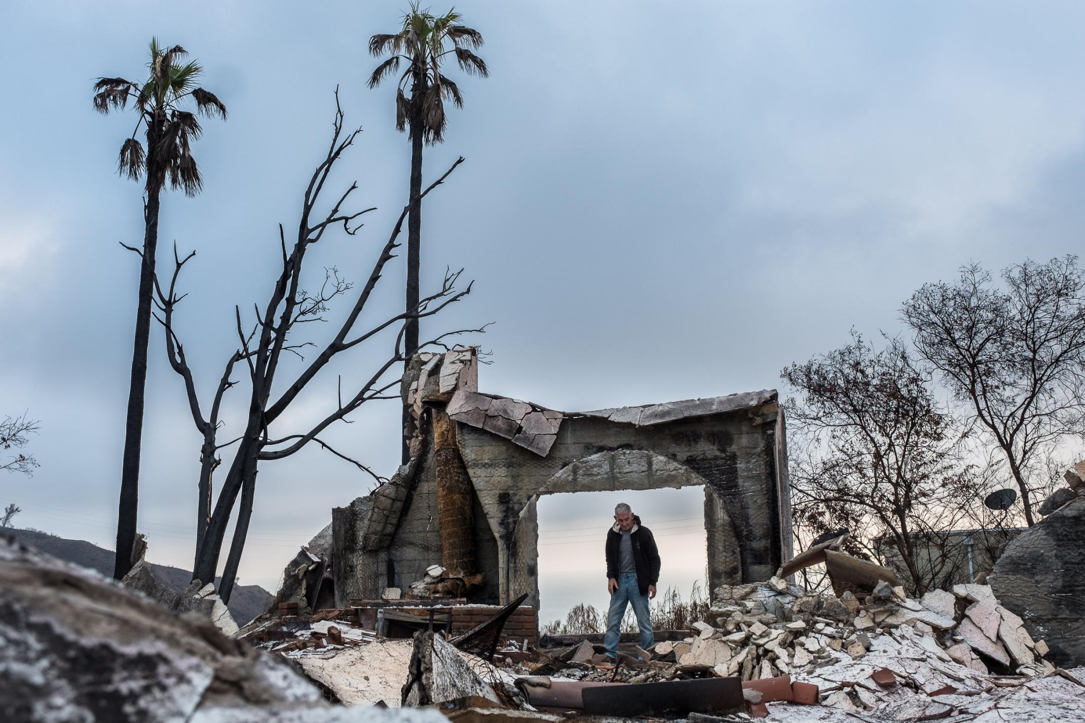 - The Woolsey fire - Mike stands in what used to be the doorway to his and his...
