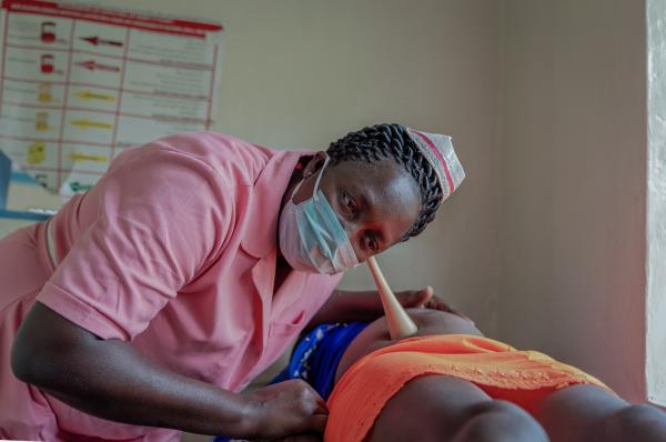 Image from Photography - Jessica Namakula, midwife at Bushiyi Health Center III in...