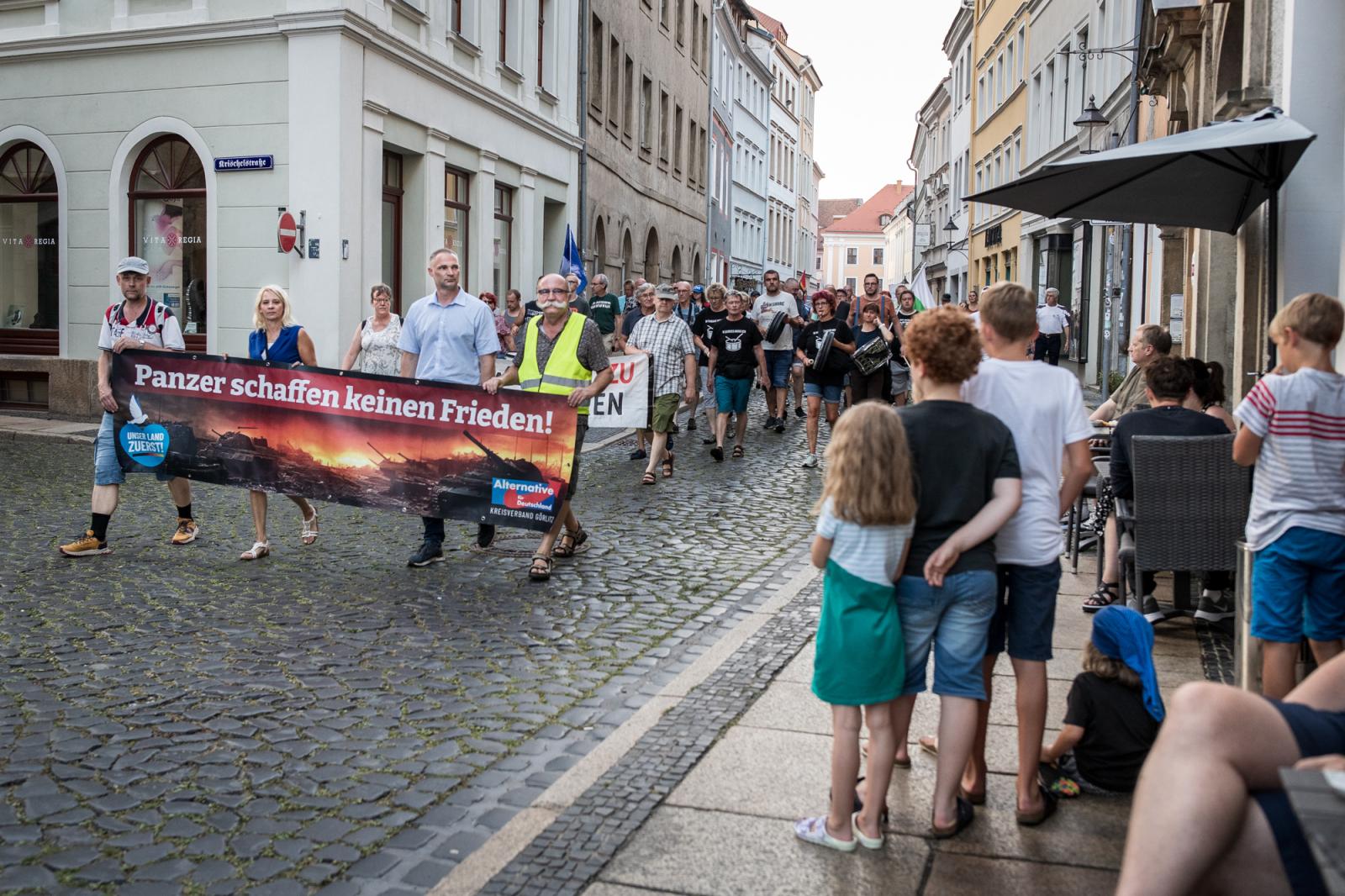 AfD supporters, carrying a bann...any, August 21, 2023.&nbsp;
