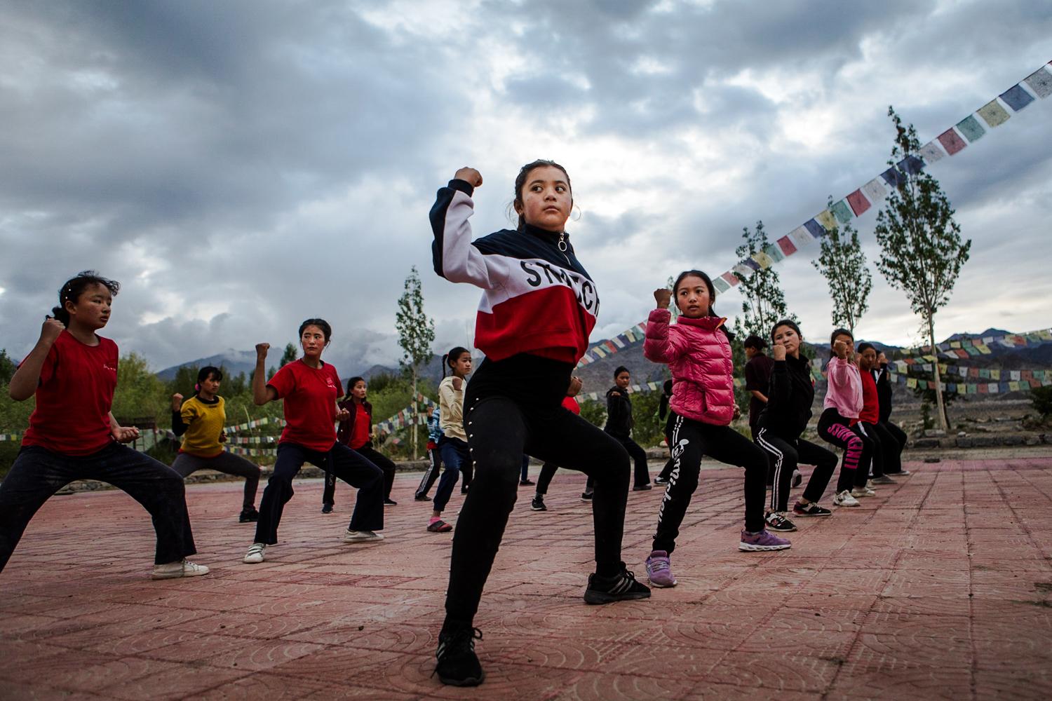THE KUNG FU NUNS OF THE HIMALAYAS  - Stanzin Dehdol (C), 12, practices self-defense techniques...