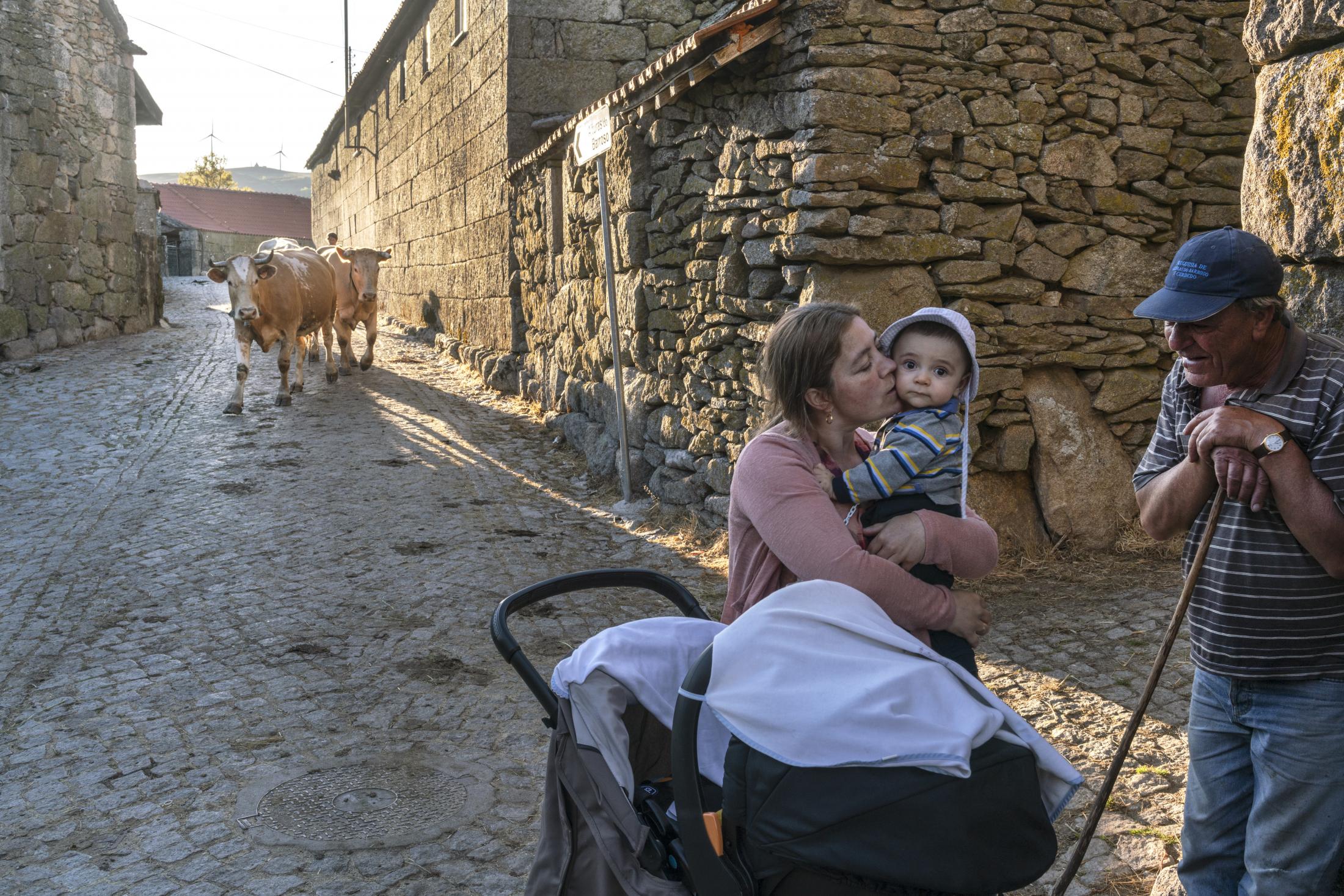 Barroso: An Ancient Farming Culture in Northern Portugal Becomes a World Heritage - Elias Coelho (right), chats with a visiting relative of a...