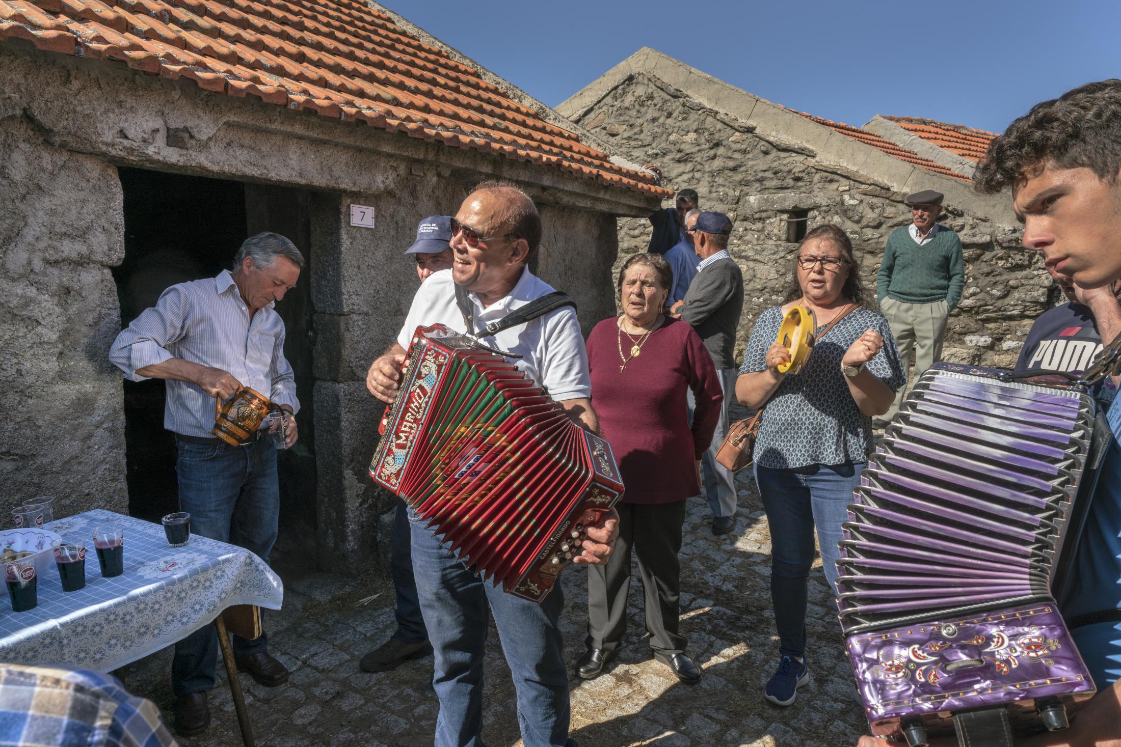 Barroso: An Ancient Farming Culture in Northern Portugal Becomes a World Heritage - Residents of Vilarinho Seco, sing and drink after a...