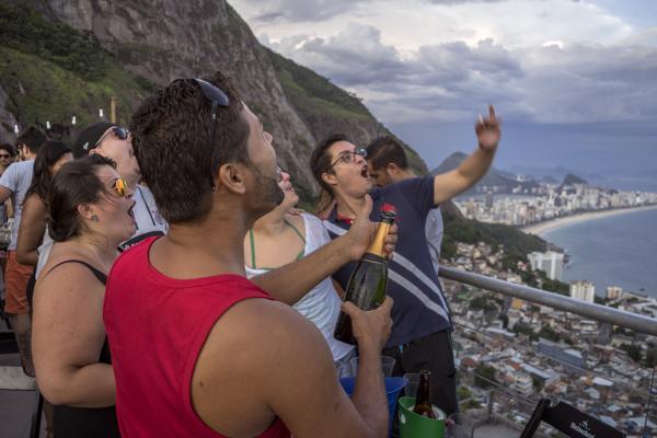 Image from Vidigal - Tourists enjoy an afternoon of samba and feijoada at Bar...