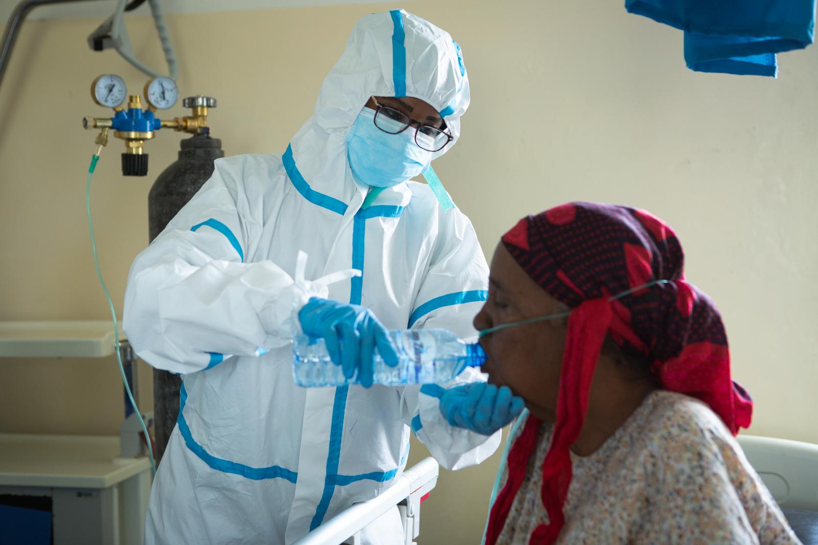One of the nurses helps quenche...Hospital in Mogadishu, Somalia.